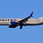 Washington, United States: A United Airlines flight bound for Guatemala City made an emergency diversion to Washington Dulles International Airport after a passenger allegedly attempted to open a cabin door at cruising altitude and assaulted another traveler, according to air traffic control communications and federal authorities. The incident involved United Airlines Flight 1551, operated by a Boeing 737 MAX 8, which departed from Newark Liberty International Airport on Thursday evening carrying 145 passengers and six crew members. The aircraft had been en route to Guatemala City when the crew declared an emergency and diverted to Washington Dulles International Airport in Virginia. According to audio between the flight crew and air traffic controllers, the pilot informed controllers that the disruptive passenger attempted to open Door 2L while the aircraft was cruising at approximately 36,000 feet. The pilot also reported that the passenger later assaulted another individual onboard. During the exchange, the tower asked the crew which door the passenger had attempted to access. The pilot responded: “Door 2L at 36,000 feet and then [the passenger] assaulted a fellow passenger.” When controllers asked whether there were any injuries onboard, the pilot replied: “Not to our knowledge.” The aircraft landed safely at Washington Dulles at approximately 8:38 p.m. local time. Law enforcement and emergency personnel met the aircraft upon arrival. The FBI later confirmed that agents responded to the incident at the airport, although the agency did not immediately release additional details regarding the passenger’s identity, possible charges, or whether the individual was taken into federal custody. Flight tracking data showed the aircraft remained airborne for a period before diverting toward the Washington region instead of continuing south toward Guatemala. The diversion temporarily disrupted the scheduled international service but no injuries among passengers or crew were officially reported. United Airlines had not issued a detailed public statement at the time of publication regarding the circumstances surrounding the diversion or the status of the passenger involved. Federal authorities are expected to review crew reports, passenger statements, and onboard evidence as part of the investigation.