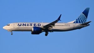 Washington, United States: A United Airlines flight bound for Guatemala City made an emergency diversion to Washington Dulles International Airport after a passenger allegedly attempted to open a cabin door at cruising altitude and assaulted another traveler, according to air traffic control communications and federal authorities. The incident involved United Airlines Flight 1551, operated by a Boeing 737 MAX 8, which departed from Newark Liberty International Airport on Thursday evening carrying 145 passengers and six crew members. The aircraft had been en route to Guatemala City when the crew declared an emergency and diverted to Washington Dulles International Airport in Virginia. According to audio between the flight crew and air traffic controllers, the pilot informed controllers that the disruptive passenger attempted to open Door 2L while the aircraft was cruising at approximately 36,000 feet. The pilot also reported that the passenger later assaulted another individual onboard. During the exchange, the tower asked the crew which door the passenger had attempted to access. The pilot responded: “Door 2L at 36,000 feet and then [the passenger] assaulted a fellow passenger.” When controllers asked whether there were any injuries onboard, the pilot replied: “Not to our knowledge.” The aircraft landed safely at Washington Dulles at approximately 8:38 p.m. local time. Law enforcement and emergency personnel met the aircraft upon arrival. The FBI later confirmed that agents responded to the incident at the airport, although the agency did not immediately release additional details regarding the passenger’s identity, possible charges, or whether the individual was taken into federal custody. Flight tracking data showed the aircraft remained airborne for a period before diverting toward the Washington region instead of continuing south toward Guatemala. The diversion temporarily disrupted the scheduled international service but no injuries among passengers or crew were officially reported. United Airlines had not issued a detailed public statement at the time of publication regarding the circumstances surrounding the diversion or the status of the passenger involved. Federal authorities are expected to review crew reports, passenger statements, and onboard evidence as part of the investigation.