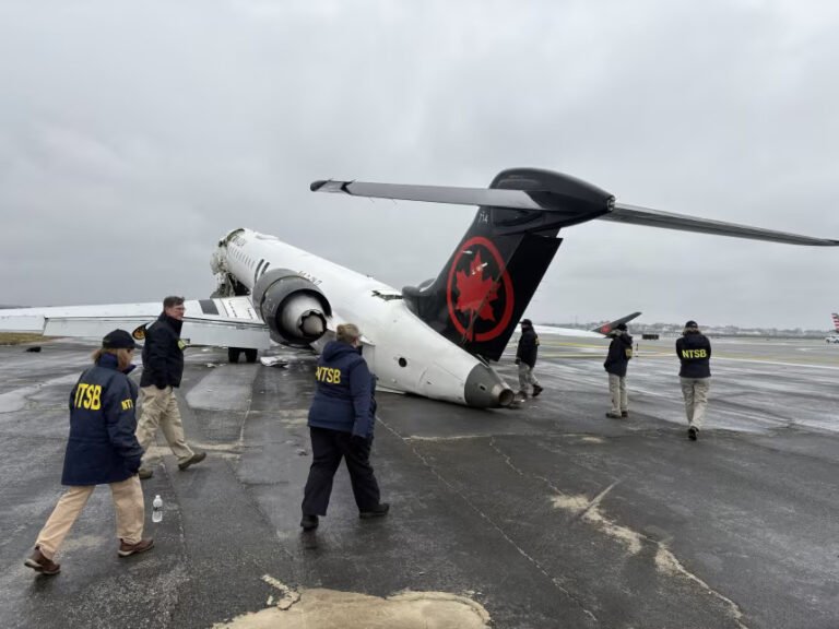 FAA Announces $16.5M Nationwide Airport Vehicle Transponder Plan After LaGuardia Crash SEO DES: Investigators found the fire truck lacked a transponder, preventing ASDE-X warnings before the crash that killed two pilots and injured dozens SOCIAL: The FAA will invest $16.5 million to equip around 1,900 airport vehicles at 264 U.S. airports with transponders following the deadly March 2026 Air Canada Express runway collision at New York’s LaGuardia Airport. Investigators found the airport fire truck involved lacked a transponder, preventing the ASDE-X safety system from detecting the vehicle and issuing a warning before the crash, which killed both pilots and injured dozens. The FAA says the new technology will improve runway safety, enhance surface tracking for controllers, and help prevent future runway incursions involving ground vehicles. Washington, United States: The Federal Aviation Administration (FAA) has announced a nationwide initiative to equip thousands of airport vehicles with transponders following the deadly March 2026 runway collision at New York’s LaGuardia Airport involving an Air Canada Express regional jet and an airport fire truck. The FAA said it will invest $16.5 million to install transponders on approximately 1,900 airport vehicles operating across 264 U.S. airports, aiming to strengthen runway safety and improve real-time surface tracking for air traffic controllers. The decision follows findings from the National Transportation Safety Board (NTSB) investigation into the March 22 collision between Air Canada Express Flight 8646, operated by Jazz Aviation, and a Port Authority fire truck at LaGuardia Airport. Investigators revealed that the fire truck involved in the accident was not equipped with a transponder, preventing the airport’s Advanced Surface Detection Equipment-X (ASDE-X) system from accurately tracking the vehicle and generating a collision warning for controllers. The Air Canada Express Bombardier CRJ900 had arrived from Montreal and was landing on Runway 4 when the fire truck crossed the active runway while responding to a separate emergency involving a United Airlines aircraft. Seconds before impact, controllers repeatedly instructed the vehicle to stop, but the aircraft collided with the truck during touchdown. Both pilots were killed, while dozens of passengers and crew members suffered injuries. According to preliminary NTSB findings, the ASDE-X runway safety system at LaGuardia failed to issue an automated alert warning controllers of the dangerous proximity between the aircraft and the vehicle. Investigators said the absence of a transponder on the fire truck was a significant factor in the system’s inability to detect and predict the vehicle’s movement. FAA Administrator Bryan Bedford said the deployment of transponder technology would help close critical gaps in airport surface surveillance and improve situational awareness for controllers operating at busy airports. The FAA added that airports can also use federal grant funding to install similar equipment on locally operated vehicles. More than 50 airports have already expressed interest in adopting the technology. The FAA’s plan covers vehicles operating at airports equipped with ASDE-X and related surface monitoring systems, which rely partly on transponder data to track aircraft and ground vehicles moving on runways and taxiways. Aviation safety experts have long advocated broader use of the technology to reduce runway incursions and prevent collisions involving airport vehicles. The Port Authority of New York and New Jersey had earlier confirmed plans to equip emergency response vehicles at LaGuardia, John F. Kennedy International Airport, and Newark Liberty International Airport with transponders following the accident.