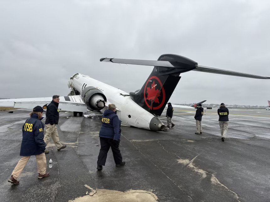 FAA Announces $16.5M Nationwide Airport Vehicle Transponder Plan After LaGuardia Crash SEO DES: Investigators found the fire truck lacked a transponder, preventing ASDE-X warnings before the crash that killed two pilots and injured dozens SOCIAL: The FAA will invest $16.5 million to equip around 1,900 airport vehicles at 264 U.S. airports with transponders following the deadly March 2026 Air Canada Express runway collision at New York’s LaGuardia Airport. Investigators found the airport fire truck involved lacked a transponder, preventing the ASDE-X safety system from detecting the vehicle and issuing a warning before the crash, which killed both pilots and injured dozens. The FAA says the new technology will improve runway safety, enhance surface tracking for controllers, and help prevent future runway incursions involving ground vehicles. Washington, United States: The Federal Aviation Administration (FAA) has announced a nationwide initiative to equip thousands of airport vehicles with transponders following the deadly March 2026 runway collision at New York’s LaGuardia Airport involving an Air Canada Express regional jet and an airport fire truck. The FAA said it will invest $16.5 million to install transponders on approximately 1,900 airport vehicles operating across 264 U.S. airports, aiming to strengthen runway safety and improve real-time surface tracking for air traffic controllers. The decision follows findings from the National Transportation Safety Board (NTSB) investigation into the March 22 collision between Air Canada Express Flight 8646, operated by Jazz Aviation, and a Port Authority fire truck at LaGuardia Airport. Investigators revealed that the fire truck involved in the accident was not equipped with a transponder, preventing the airport’s Advanced Surface Detection Equipment-X (ASDE-X) system from accurately tracking the vehicle and generating a collision warning for controllers. The Air Canada Express Bombardier CRJ900 had arrived from Montreal and was landing on Runway 4 when the fire truck crossed the active runway while responding to a separate emergency involving a United Airlines aircraft. Seconds before impact, controllers repeatedly instructed the vehicle to stop, but the aircraft collided with the truck during touchdown. Both pilots were killed, while dozens of passengers and crew members suffered injuries. According to preliminary NTSB findings, the ASDE-X runway safety system at LaGuardia failed to issue an automated alert warning controllers of the dangerous proximity between the aircraft and the vehicle. Investigators said the absence of a transponder on the fire truck was a significant factor in the system’s inability to detect and predict the vehicle’s movement. FAA Administrator Bryan Bedford said the deployment of transponder technology would help close critical gaps in airport surface surveillance and improve situational awareness for controllers operating at busy airports. The FAA added that airports can also use federal grant funding to install similar equipment on locally operated vehicles. More than 50 airports have already expressed interest in adopting the technology. The FAA’s plan covers vehicles operating at airports equipped with ASDE-X and related surface monitoring systems, which rely partly on transponder data to track aircraft and ground vehicles moving on runways and taxiways. Aviation safety experts have long advocated broader use of the technology to reduce runway incursions and prevent collisions involving airport vehicles. The Port Authority of New York and New Jersey had earlier confirmed plans to equip emergency response vehicles at LaGuardia, John F. Kennedy International Airport, and Newark Liberty International Airport with transponders following the accident.