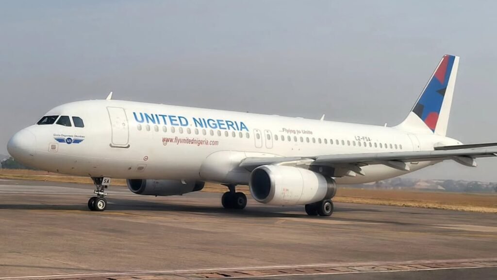 Lagos, Nigeria: Nigeria’s aviation sector is facing mounting operational and financial strain as soaring jet fuel prices and worsening supply shortages trigger widespread flight disruptions, route cuts and growing safety concerns across the country’s domestic airline industry. Industry officials and airline operators say the crisis has intensified in recent weeks despite government intervention efforts and increased local refining capacity from the Dangote Refinery, which began full-scale operations earlier this year. Airlines argue that while domestic production has improved supply volumes, the price of Jet A1 aviation fuel remains prohibitively high under Nigeria’s deregulated fuel market. According to the National Association of Aircraft Pilots and Engineers (NAAPE), persistent fuel scarcity has caused repeated flight delays, last-minute schedule changes and route cancellations as carriers struggle to secure sufficient supplies for daily operations. The association warned that prolonged disruptions are also forcing extended crew duty periods, raising concerns over fatigue and operational safety in an industry governed by strict rest regulations. NAAPE President Captain Bunmi Gindeh said the shortages were stretching operational planning and placing additional pressure on pilots, engineers and airline personnel. Domestic carriers have reported that jet fuel prices have risen dramatically since February, with some operators stating costs have more than quadrupled in recent months. Airlines say fuel expenses now account for between 30% and 40% of operating costs in Nigeria, significantly above the global average, making several domestic routes commercially unviable. Local airline Rano Air stated that the sustained increase in fuel prices had forced operational adjustments and schedule revisions. Other carriers have reportedly begun cutting unprofitable routes and rescheduling flights to reduce exposure to escalating fuel costs. The Airline Operators of Nigeria (AON), representing the country’s domestic airlines, had earlier threatened to suspend nationwide flight operations after accusing fuel marketers of imposing “astronomical and artificial” increases in Jet A1 prices. The group warned that the crisis was pushing airlines toward unsustainable losses and could have broader economic implications affecting employment, banking operations and national connectivity. The dispute prompted emergency talks with the Nigerian government in April, leading airlines to temporarily suspend their planned shutdown following appeals from Aviation Minister Festus Keyamo. As part of emergency relief measures, Nigerian authorities introduced temporary price caps on aviation fuel and allowed airlines to purchase fuel on credit for a limited period. Regulators also proposed direct fuel supply arrangements between marketers and airlines, debt relief measures for operators and discussions with Dangote Refinery over pricing mechanisms. Under the temporary framework, the Nigerian Midstream and Downstream Petroleum Regulatory Authority (NMDPRA) capped jet fuel prices between 1,760 and 1,988 naira per litre in Lagos and between 1,809 and 2,037 naira per litre in Abuja based on April benchmark pricing. Despite those measures, airlines say market conditions remain volatile. Nigeria’s aviation industry continues to face broader structural challenges including foreign exchange shortages, high aircraft maintenance costs, limited access to spare parts and inadequate airport infrastructure. The crisis has unfolded alongside wider global disruptions in the aviation fuel market linked to escalating tensions in the Middle East and instability surrounding shipping routes through the Strait of Hormuz. Airlines worldwide have reported major increases in fuel-related costs.