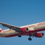 Bangalore, India: An Air India Airbus A321 operating flight AI2651 from Delhi to Bengaluru suffered a tail-strike incident while landing at Bengaluru’s Kempegowda International Airport on Thursday morning, prompting the airline to ground the aircraft for detailed technical inspections. The incident occurred during the landing phase of the domestic service arriving from Delhi. According to airline officials and multiple media reports, the aircraft landed safely and all passengers and crew members disembarked normally without injuries. The aircraft encountered wake turbulence while approaching the runway at Bengaluru airport. The turbulence was reportedly generated by a departing wide-body aircraft operating nearby at the time of the approach. As the Airbus A321 approached for landing, the pilots initiated a precautionary go-around manoeuvre after experiencing unstable conditions caused by the wake turbulence. During the manoeuvre, the aircraft’s rear lower fuselage reportedly made contact with the runway, resulting in the tail strike. Air India confirmed the occurrence in an official statement, saying the aircraft “experienced a tail-strike during landing.” The airline added that the aircraft has since been withdrawn from service for comprehensive inspections and engineering assessments. The aircraft involved was a narrow-body Airbus A321 operating the Delhi–Bengaluru sector as AI2651. Flight-tracking data also identified the aircraft as an Airbus A321neo variant typically deployed on high-density domestic routes. The aircraft was carrying 181 people, including crew members onboard during the incident. Following the incident, Air India cancelled the return Bengaluru–Delhi service AI2652. The airline stated that alternative travel arrangements were being made for affected passengers while ground staff in Bengaluru were assisting travellers with rebooking and support services. The airline further said the incident would be investigated in coordination with relevant aviation regulatory authorities and under established operational safety procedures.