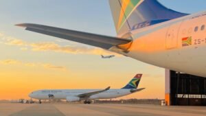 Cape Town, South Africa: South African Airways (SAA) is facing mounting scrutiny after allegations emerged that the airline delayed reporting a serious fuel emergency involving two flights at Cape Town International Airport, prompting calls for a Parliamentary inquiry into aviation safety oversight in South Africa. The controversy centres on SAA flights SA313 and SA327, which were affected by severe weather conditions over Cape Town on 11 May 2026. According to reports, the airline allegedly took eight days to notify the South African Civil Aviation Authority (SACAA) about the incidents, despite regulations requiring such events to be reported within 72 hours. The issue has triggered criticism from South Africa’s opposition Democratic Alliance (DA), which has formally requested an urgent hearing before Parliament’s Portfolio Committee on Transport. The party said the delay raises concerns about SAA’s safety management systems, regulatory compliance, and transparency. Chris Hunsinger, Democratic Alliance spokesperson on transport, said the incident reflects what he described as a broader pattern of failures within the country’s aviation oversight framework. He warned that repeated operational incidents, delayed reporting, and questions surrounding accountability were eroding public confidence in aviation safety. According to aviation sources cited in local reports, flight SA313, operated by an Airbus A320 from Johannesburg to Cape Town, encountered severe weather during its arrival into Cape Town amid gale-force north-westerly winds, heavy rain, low cloud, and dangerous windshear conditions. The aircraft reportedly conducted a missed approach after receiving onboard windshear alerts. Pilot and aviation analyst Duncan Gillespie stated that a second landing attempt at Cape Town would likely have left the aircraft without sufficient reserves to divert safely to its nominated alternate airport, George Airport. The aircraft subsequently diverted to George, but deteriorating weather conditions there allegedly prevented a safe landing. The aircraft later continued to Gqeberha, where reports claim it landed with fuel reserves below internationally accepted minimum levels. Gillespie alleged the aircraft may have landed with less than 15 minutes of fuel remaining. Under international aviation regulations, commercial aircraft are generally expected to land with approximately 30 minutes of final reserve fuel, and crews are normally required to declare a fuel emergency if projected landing fuel falls below that threshold. Questions have also been raised over whether the crew declared a formal “Mayday Fuel” emergency during the incident. Gillespie noted there was no visible indication on public flight-tracking systems that the aircraft had transmitted the emergency transponder code commonly associated with a Mayday declaration. SAA spokesperson Mphilo Dlamini did not directly address questions regarding the alleged fuel emergency, remaining fuel levels after landing, or whether the crew had declared an emergency. Instead, the airline stated that severe weather conditions affected operations across the Western Cape on 11 May and maintained that SAA followed all required aviation safety procedures and reporting protocols. The SACAA had also not publicly responded to detailed media questions at the time several reports were published. The DA said it intends summoning SAA, SACAA, Air Traffic and Navigation Services (ATNS), and the Department of Transport before Parliament to explain the delayed reporting, oversight concerns, and broader operational issues affecting South African aviation. The party also highlighted ongoing problems within ATNS, including the suspension of 326 instrument flight procedures. The DA further pointed to concerns over regulatory independence, arguing that SACAA investigates entities operating under the same government department, potentially creating conflicts of interest in aviation oversight.