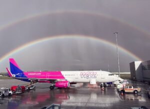 Belgrade, Serbia: Low-cost carrier Wizz Air has launched an unprecedented public attack on Serbian authorities, alleging that newly adopted aviation regulations are designed to force the airline to shut down its Belgrade base from November 2026, a move it says would violate European aviation agreements, reduce competition, and threaten jobs. In a strongly worded statement released on June 3, Wizz Air claimed that Serbian authorities are attempting to introduce measures that would effectively prevent foreign airlines from maintaining base operations in the country unless they are Serbian operators. The airline argues that the changes amount to a protectionist policy intended to shield state-backed national carrier Air Serbia from competition. According to Wizz Air, the proposed measures would make it impossible for the airline to continue operating its Belgrade base under its current business model despite having maintained a presence in Serbia for more than 15 years. The airline said it has invested hundreds of millions of euros in Serbia since launching operations in 2010 and has carried more than 14 million passengers to and from the country. Wizz Air currently operates 29 routes linking Belgrade with 26 destinations across 10 countries and maintains one of the largest low-cost carrier networks in the Serbian market. Wizz Air warned that the closure of its Belgrade base would result in the loss of more than 150 direct jobs while also impacting thousands of positions indirectly supported through tourism, hospitality, airport services, and related sectors. The carrier further argued that Serbian travelers would face fewer direct flight options, reduced connectivity, diminished consumer choice, and potentially higher airfares if the measures are implemented. "The measures they plan to use against Wizz Air are illegal," the airline's Chief Corporate Officer, Owain Jones, said in comments accompanying the statement. He accused Serbian authorities of engaging in discriminatory practices and called for the preservation of fair and transparent market conditions for all airlines operating in the country. Central to Wizz Air's argument is the European Common Aviation Area (ECAA) Agreement, often referred to as the "Open Skies" framework, which provides participating countries and airlines with market access rights and seeks to ensure fair competition across European aviation markets. The airline contends that the Serbian government's actions represent a direct breach of the country's obligations under the ECAA Agreement and undermine principles designed to foster competition and connectivity within Europe. Wizz Air has urged Serbian authorities to withdraw the measures and has called on European institutions to intervene. The carrier said it expects Serbia, as an EU candidate country and signatory to international aviation agreements, to uphold its commitments and ensure equal treatment for all operators. The dispute comes at a time of intensifying competition between Wizz Air and Air Serbia at Belgrade Nikola Tesla Airport. Over the past year, both airlines have expanded their networks and increasingly launched competing services on several routes from the Serbian capital. Serbian authorities, however, have rejected Wizz Air's allegations. The Civil Aviation Directorate of the Republic of Serbia has stated that the newly adopted rulebook does not revoke any airline's traffic rights and applies equally to all carriers operating in the country. Officials maintain that the changes are regulatory in nature and do not prevent foreign airlines from serving Serbia or opening new routes in accordance with existing international agreements. Despite those assurances, questions remain over whether foreign carriers will be able to continue maintaining aircraft bases in Serbia under the revised framework. For now, Wizz Air says it remains committed to its Serbian operations and passengers but warns that unless the measures are reversed, its Belgrade base could face closure later this year, potentially reshaping the competitive landscape at one of the Balkans' fastest-growing aviation hubs.