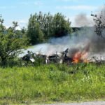 Missouri, United States: Twelve people, including a pilot and 11 skydivers, were killed when a skydiving aircraft crashed shortly after takeoff from Butler Memorial Airport in western Missouri on Sunday, marking one of the deadliest U.S. skydiving aviation accidents in recent years. The aircraft, identified by investigators as a Pacific Aerospace P750XL single-engine turboprop, was being operated by Skydive Kansas City and was carrying a group of skydivers for a scheduled jump flight when the accident occurred near Butler, a town located about 65 miles south of Kansas City. According to Skydive Kansas City, all 12 occupants onboard lost their lives in the crash. "Tragically, all 12 individuals aboard lost their lives in the accident," the company said in a statement, adding that victim identities would not be released until all next of kin had been notified. Dennis Jacobs, acting manager of Butler Memorial Airport and director of the Bates County Emergency Management Agency, said the aircraft departed at approximately 11:20 a.m. local time but appeared unable to climb normally after takeoff. Jacobs told reporters the airplane made a sharp left turn shortly after becoming airborne before crashing roughly 300 yards from the runway. "It had just taken off and made a left turn," Jacobs said. "In my opinion I think it was losing power, and he was trying to make it over to the highway and land, and he stalled and went down nose first and caught fire," he said. Witness accounts and local officials indicated the pilot may have been attempting an emergency landing near a nearby highway before the aircraft descended rapidly and impacted terrain. Authorities said the passengers were participating in a skydiving outing organized by Skydive Kansas City. According to reports, the group included experienced skydivers as well as tandem jump participants preparing for a recreational jump flight. Missouri Highway Patrol Sgt. Justin Ewing said emergency responders received reports of an aircraft down and engulfed in flames at approximately 11:30 a.m. The aircraft crashed in a field adjacent to the airport and was consumed by fire following impact. Emergency crews extinguished the blaze shortly afterward, but there were no survivors. One of the most tragic aspects of the accident was that several family members of those onboard reportedly witnessed the crash from the ground. Bates County Sheriff Chad Anderson said relatives were present at the airport when the aircraft went down. Clergy members, volunteers and grief counselors were mobilized to assist families at the scene while authorities worked to identify victims and notify relatives. Missouri Governor Mike Kehoe said multiple state agencies were responding to support local authorities and affected families."Our prayers are with the community and all those working to help," the governor said. The Federal Aviation Administration (FAA) and the National Transportation Safety Board (NTSB) have launched investigations into the accident. FAA officials arrived at the crash site Sunday, while an NTSB investigation team was scheduled to arrive Monday to begin documenting evidence, examining the wreckage and interviewing witnesses. The NTSB said a final report determining the probable cause of the accident could take between 12 and 24 months to complete. Authorities have not released any preliminary findings and stressed that the cause remains undetermined.