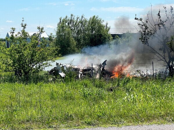 Missouri, United States: Twelve people, including a pilot and 11 skydivers, were killed when a skydiving aircraft crashed shortly after takeoff from Butler Memorial Airport in western Missouri on Sunday, marking one of the deadliest U.S. skydiving aviation accidents in recent years. The aircraft, identified by investigators as a Pacific Aerospace P750XL single-engine turboprop, was being operated by Skydive Kansas City and was carrying a group of skydivers for a scheduled jump flight when the accident occurred near Butler, a town located about 65 miles south of Kansas City. According to Skydive Kansas City, all 12 occupants onboard lost their lives in the crash. "Tragically, all 12 individuals aboard lost their lives in the accident," the company said in a statement, adding that victim identities would not be released until all next of kin had been notified. Dennis Jacobs, acting manager of Butler Memorial Airport and director of the Bates County Emergency Management Agency, said the aircraft departed at approximately 11:20 a.m. local time but appeared unable to climb normally after takeoff. Jacobs told reporters the airplane made a sharp left turn shortly after becoming airborne before crashing roughly 300 yards from the runway. "It had just taken off and made a left turn," Jacobs said. "In my opinion I think it was losing power, and he was trying to make it over to the highway and land, and he stalled and went down nose first and caught fire," he said. Witness accounts and local officials indicated the pilot may have been attempting an emergency landing near a nearby highway before the aircraft descended rapidly and impacted terrain. Authorities said the passengers were participating in a skydiving outing organized by Skydive Kansas City. According to reports, the group included experienced skydivers as well as tandem jump participants preparing for a recreational jump flight. Missouri Highway Patrol Sgt. Justin Ewing said emergency responders received reports of an aircraft down and engulfed in flames at approximately 11:30 a.m. The aircraft crashed in a field adjacent to the airport and was consumed by fire following impact. Emergency crews extinguished the blaze shortly afterward, but there were no survivors. One of the most tragic aspects of the accident was that several family members of those onboard reportedly witnessed the crash from the ground. Bates County Sheriff Chad Anderson said relatives were present at the airport when the aircraft went down. Clergy members, volunteers and grief counselors were mobilized to assist families at the scene while authorities worked to identify victims and notify relatives. Missouri Governor Mike Kehoe said multiple state agencies were responding to support local authorities and affected families."Our prayers are with the community and all those working to help," the governor said. The Federal Aviation Administration (FAA) and the National Transportation Safety Board (NTSB) have launched investigations into the accident. FAA officials arrived at the crash site Sunday, while an NTSB investigation team was scheduled to arrive Monday to begin documenting evidence, examining the wreckage and interviewing witnesses. The NTSB said a final report determining the probable cause of the accident could take between 12 and 24 months to complete. Authorities have not released any preliminary findings and stressed that the cause remains undetermined.