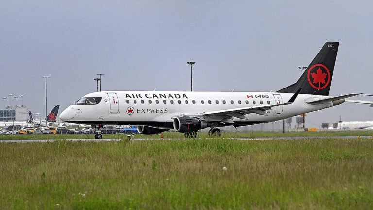 New Jersey, United States: An Air Canada Express flight bound for Halifax, Nova Scotia, was forced to divert to Boston on Wednesday after the aircraft’s captain suffered a serious medical emergency while the flight was airborne, prompting an emergency response from crew members, passengers and aviation authorities. The incident occurred aboard Air Canada Express Flight AC7664, operated by regional carrier PAL Airlines using a De Havilland Dash 8-400 (Q400) turboprop aircraft. According to Air Canada, the flight departed Newark Liberty International Airport in New Jersey at approximately 12:55 p.m. EDT on June 24 and was scheduled to operate a routine service to Halifax Stanfield International Airport in Nova Scotia. The aircraft was carrying 61 passengers. Air Canada said the captain experienced a medical issue during the flight and was removed from the flight deck in accordance with established safety procedures. The first officer immediately assumed control of the aircraft and initiated a diversion to Boston Logan International Airport. The airline emphasized that pilots are trained to safely operate and land aircraft independently if circumstances require. Flight-tracking data reviewed by multiple media outlets showed the aircraft had been airborne for roughly an hour when the diversion occurred. Data indicated the aircraft began descending approximately 30 minutes after departure before proceeding toward Boston. The flight, which normally takes about two hours and 15 minutes, did not continue to Halifax as planned. Passengers Describe Sudden Mid-Air Emergency. Several passengers later described a dramatic sequence of events inside the cabin. Passenger Rodney McDonald told ABC News that the situation became apparent when the aircraft suddenly swerved during flight. According to McDonald, the movement did not resemble turbulence and instead felt as though the flight controls had been abruptly disturbed multiple times. "The moment the plane swerved, I knew something was wrong because it was not turbulence," he told ABC News. McDonald said concern quickly spread through the cabin, with passengers fearing a potentially serious emergency. He recalled his children immediately beginning to pray as uncertainty grew over the aircraft's condition. The situation escalated when, according to passenger accounts, a flight attendant rushed into the cockpit before emerging with one of the pilots. McDonald said cabin crew members appeared to be struggling with the incapacitated pilot and requested assistance from passengers. Several travelers responded. Passenger Elizabeth Akinyemi told ABC News that the captain appeared to be suffering what looked like a seizure. She said the medical episode continued for approximately 40 minutes. Witnesses reported that the pilot displayed erratic behavior and at times attempted to return to the cockpit while experiencing the medical event. McDonald said he and approximately four other passengers helped crew members restrain the captain in the cabin while the first officer continued flying the aircraft toward Boston. No injuries among passengers were reported safe Landing In Boston. The first officer successfully diverted and landed the aircraft at Boston Logan International Airport at approximately 2 p.m. local time. The Federal Aviation Administration later confirmed that Air Canada Flight 7664 landed safely after the crew reported a pilot medical emergency. Massachusetts State Police said authorities were notified at approximately 1:37 p.m. that a crew member had suffered a medical emergency and that the aircraft was being flown by the co-pilot. State police patrol units and a marine unit responded as a precaution ahead of the aircraft's arrival. Television footage from Boston showed emergency vehicles surrounding the aircraft shortly after landing. Massport Fire Rescue personnel and Boston EMS crews met the aircraft on the runway. Video and aerial footage captured emergency responders bringing a stretcher to the aircraft before transporting the pilot from the airplane. The captain was subsequently taken to Massachusetts General Hospital for treatment. Officials have not publicly disclosed the pilot's identity, medical condition or the precise nature of the medical emergency. Passengers Continue Journey. Following the safe landing, Air Canada said it began making alternate travel arrangements for affected passengers. The passengers were expected to continue their journey to Halifax later the same day. The FAA has not announced any formal investigation beyond its standard review procedures associated with in-flight medical emergencies.