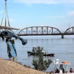 Washington, United States: Two California men were killed after their float-equipped aircraft struck a high-voltage transmission line and crashed into the Columbia River near the Tri-Cities area of southeastern Washington on Wednesday afternoon, triggering widespread power outages, a brush fire, and a large-scale emergency response. The accident occurred at approximately 2:29 p.m. PDT on June 24 near the Cable Bridge and Clover Island, between Pasco and Kennewick. According to emergency officials, the aircraft collided with a transmission line spanning the Columbia River before overturning and crashing into the water. Authorities later identified the victims as Randy J. Peterson, 64, of Sonoma, California, who was piloting the aircraft, and Eric Wayne Houston, 50, also of Sonoma, who was traveling as a passenger. The Franklin County Coroner confirmed both men died at the scene. Officials said the pair had departed California earlier that day and were en route to Priest Lake, Idaho, where they planned to attend a gathering of seaplane enthusiasts. Witnesses reported seeing the aircraft flying unusually low over the Columbia River moments before the crash. According to accounts provided to local media, the pilot appeared to be attempting to fly beneath the transmission lines crossing the river when the aircraft struck one of the lower power cables. The impact severed the transmission line, causing extensive power outages across the Tri-Cities region. Benton Public Utility District reported that more than 11,000 customers lost electricity. The power outage extended south of the Columbia River from Highway 395 west toward Leslie Road and affected almost 20% of the public utility district’s customers. Franklin PUD also reported a power outage to about 1,800 customers in Pasco north of the Columbia River to Interstate 182. The downed power line also ignited a brush fire near Riverview Park and the Pasco Youth Baseball Complex. Firefighters quickly contained the blaze before it could spread further. Multiple emergency agencies responded immediately to the crash, including the Pasco Fire Department, Pasco Police Department, Franklin County Sheriff's Office, Benton County Sheriff's Office, Columbia Basin Dive Rescue, the U.S. Coast Guard, Washington State Patrol, and utility crews from Benton PUD and Franklin PUD. Several witnesses reportedly entered the river in an attempt to rescue the occupants before emergency crews arrived. However, the aircraft had overturned and both occupants were trapped inside. Rescue personnel later recovered the victims from the submerged aircraft. The floatplane remained partially afloat before drifting downstream, where responders secured it using rescue boats. A crane was later used to lift the wreckage from the Columbia River for investigators. The Washington Department of Ecology also responded to monitor the river for any fuel spill. Officials later determined there was no significant environmental impact, stating that only a small amount of fuel had escaped and quickly dissipated. The National Transportation Safety Board (NTSB) has launched an investigation into the accident, with assistance from the Federal Aviation Administration (FAA) and local law enforcement. Investigators are expected to examine the aircraft's maintenance history, pilot qualifications, weather conditions, flight path, and the circumstances that led to the collision with the transmission line. The Franklin County Sheriff's Office is coordinating the local investigation while federal authorities determine the probable cause of the crash. Publicly available Federal Aviation Administration registration records indicate the float-equipped aircraft was registered in Sonoma, California. However, authorities have not officially identified the registered owner, and investigators have not released additional ownership details. Emergency responders stated that numerous agencies worked together to secure the crash site, recover the victims, restore power, extinguish the brush fire, and ensure public safety throughout the incident. The NTSB said it is investigating the circumstances surrounding the crash and will release additional information as the investigation progresses. A preliminary report is expected in the coming weeks, while the final report may take several months. The cause of the accident remains under investigation.