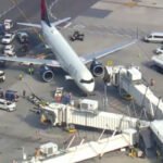 New York, United States: A Delta Air Lines Airbus A321neo landed safely at New York’s John F. Kennedy International Airport (JFK) on June 16 after reports of a possible nose-wheel tire issue prompted a large-scale emergency response from airport and city authorities. Delta Flight 1966 was operating a scheduled service from San Juan, Puerto Rico, to New York-JFK when concerns emerged regarding the aircraft’s nose landing gear during its approach into the airport. Initial reports received by emergency responders indicated that the inbound aircraft may have been experiencing issues involving its front tires, leading authorities to prepare for a potential emergency landing. According to the New York City Fire Department (FDNY), a call was received at approximately 4:45 p.m. local time reporting that the aircraft had "two flat front tires." In response, the department initiated a precautionary second-alarm standby deployment, dispatching 46 units and 141 fire and emergency medical personnel to JFK Airport. The aircraft, an Airbus A321neo operated by Delta Air Lines, was carrying 170 passengers along with six crew members, consisting of two pilots and four flight attendants. Flight tracking data shows the aircraft landed safely at JFK at approximately 5:31 p.m. local time. Emergency vehicles were positioned alongside the runway as a precaution while the aircraft completed its landing. Following touchdown, the aircraft remained under observation before being cleared to continue taxiing to the terminal. The aircraft was subsequently escorted to Terminal 4, where it arrived without incident. No injuries were reported among passengers or crew. Following the landing, Delta Air Lines clarified that the situation was less severe than initially reported. The airline stated that maintenance inspections identified damage and tread wear to one tire rather than multiple flat or blown tires. "There was some damage to one tire, but not a major situation given the maintenance team determined the aircraft was suitable to continue taxiing over to the gate for the tire replacement rather than having to do so on the taxiway," Delta said in a statement. The airline added that the aircraft was able to taxi under its own power and that the emergency response proved largely precautionary. Video footage captured by local news helicopters after the landing appeared to show the aircraft’s nose-wheel tires still inflated, further supporting Delta’s assessment that the tire had sustained damage rather than a complete failure. No evacuation was required, and passengers disembarked normally after arrival. Delta has not indicated any further operational impact resulting from the incident. The circumstances surrounding the tire damage have not been publicly disclosed, and there has been no indication of any broader safety issue involving the aircraft.