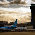 Edinburgh, Scotland: Edinburgh Airport resumed operations on Saturday after a major security incident forced the evacuation of the terminal, the closure of surrounding roads, and widespread disruption to flights and ground transport services. The incident began at approximately 6:50 p.m. local time on Friday, June 19, when authorities received reports of a potentially suspicious package at the airport. Police Scotland immediately launched a security response, ordering the evacuation of the terminal building while specialist Explosive Ordnance Disposal (EOD) teams were deployed to assess the item. A security cordon was established around the airport, and several access roads were closed as bomb disposal experts conducted their investigation. Hundreds of passengers were evacuated from the terminal and directed away from the airport while emergency personnel secured the area. According to Police Scotland, the evacuation was implemented as a precautionary measure following the report of the suspicious package. Officers urged travelers to contact their airlines for updates and warned of significant disruption while enquiries were ongoing. Airport operator Edinburgh Airport confirmed that specialist teams were investigating the item and advised passengers to check directly with their airlines before travelling to the airport. Flight operations were significantly affected throughout the evening. Multiple arriving aircraft were diverted to alternative airports, including Glasgow Airport, while numerous departures were delayed or suspended. Several flights reportedly entered holding patterns or altered their routes as the security operation unfolded. Ground transportation services were also disrupted. Coach operator Citylink announced that its airport services were unable to access the terminal because of the ongoing incident. Temporary pickup and drop-off arrangements were established at nearby locations, including the Moxy Hotel and Hilton Hotel bus stops. The airport remained largely shut down for several hours while EOD specialists examined the package. Operations began returning to normal during the early hours of Saturday after authorities completed their assessment and lifted restrictions. The prolonged closure created knock-on effects across airline schedules, with passengers warned to expect delays and operational disruptions as carriers worked to reposition aircraft and recover their networks. As of Saturday morning, airport operations had resumed, although airlines continued to advise travelers to verify the status of their flights before heading to the airport. Police Scotland has not announced any arrests in connection with the incident, and investigations into the circumstances surrounding the discovery remain ongoing.