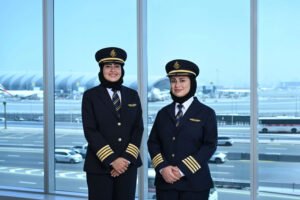 Dubai, United Arab Emirates: Emirates has promoted Hanan Mohammed Jawad and Bakhita Al Mheiri to captain, making them the airline’s first Emirati female captains and marking a significant milestone for both the carrier and the UAE’s aviation sector. The appointments were announced by Emirates on June 4, 2026, as part of its ongoing efforts to develop Emirati talent and advance opportunities for women in aviation. Both pilots began their careers through the Emirates Group’s National Cadet Pilot Programme (NCPP), a fully funded initiative launched in 1993 to train and develop Emirati commercial pilots. Their promotion to captain reflects years of training, operational experience and progression through the airline’s ranks. Hanan Mohammed Jawad joined Emirates in 2008 through the cadet pilot programme, pursuing what she described as a lifelong ambition to become a pilot. Emirates said she advanced steadily through the airline with the support of mentors and fleet management teams, ultimately accumulating 9,253 flight hours during her career. Reflecting on her achievement, Hanan said: “When I was 14, I saw the UAE’s first female pilot on TV and was struck by her confidence and presence. From that point on, all I wanted was to become a pilot.” Speaking about receiving her captain’s stripes, she added: “Receiving my fourth stripe is a proud milestone, but I don’t see it as the destination. This is just the beginning, I don’t believe the sky is the limit. The path to command is built over time, and my years as a First Officer prepared me for this moment.” Hanan also spoke about her personal development throughout her aviation career. “You change as you grow, and that’s a strength,” she said. “When I was younger, I loved drawing and reading. Today, I challenge myself in new ways. I’ve recently started skiing and I’m still a beginner, I enjoy being in that learning space. Balance matters to me now. I’ve moved from intense gym training to practices that build focus and calm yoga, aerial yoga, Pilates and reformer. They support the clarity, discipline and presence my role demands.” Bakhita Al Mheiri joined Emirates as a cadet pilot in 2011. Inspired by Emirati women who had already entered the profession, she pursued a career in aviation and progressed through successive milestones before earning command on the Boeing 777 fleet. Discussing the role mentorship played in her career, Bakhita said: “My journey at Emirates has been deeply influenced by the mentorship and guidance I received from exceptional training captains and leaders throughout my flying and command journey.” She added that their professionalism and willingness to share knowledge strengthened both her technical and leadership capabilities while teaching “the value of responsibility, discipline, and continuous learning.” Bakhita also emphasized the importance of supporting future generations of aviators. “One of the most meaningful lessons I gained throughout this journey was the importance of passing knowledge and experience forward,” she said. “With the opportunity and responsibility I have been given as a captain, I hope to carry forward the same values and mentorship that were invested in me, and to support and guide the younger generations beginning their own flying journey, so they too can continue contributing to the future and success of the UAE.” Both captains officially received their fourth stripes in 2026 and now operate Emirates’ Boeing 777 fleet. According to the airline, their achievement represents a landmark moment for Emirati women pursuing careers in commercial aviation. In a joint message to aspiring female aviators, the two captains said: “Our leadership has long recognised women as essential partners in shaping our nation's future, and Emirates is creating the environment and opportunities for women to thrive, and we will continue to build on this for future generations.” Capt Hassan Alhammadi, Emirates’ Divisional Senior Vice President Flight Operations, said the appointments demonstrate the airline’s long-term commitment to developing UAE nationals. “At Emirates, we have always committed to developing our UAE Nationals as part of the professional workforce,” Alhammadi said. “The cadet pilot programme remains vital in providing a path to young men and women to pursue professions as commercial pilots at Emirates, supporting our future pilot requirements.” He added: “We are immensely proud of Hanan and Bakhita for becoming Emirates’ first Emirati female captains, a well-deserved achievement that reflects years of dedication, professionalism, and hard work, and underscores the airline’s ability to nurture Emirati talent from entry level through to the highest leadership roles.” The National Cadet Pilot Programme, established in 1993, has produced generations of Emirati pilots who have gone on to become captains, training pilots and aviation leaders both within Emirates and across the UAE aviation industry. The programme combines academic instruction, flight training, advanced technology and safety-focused operational experience through the Emirates Flight Training Academy and the airline’s new pilot training centre. The promotion of Hanan Mohammed Jawad and Bakhita Al Mheiri comes as Emirates continues to expand opportunities for women in aviation while strengthening its Emiratisation strategy through structured career development, leadership programmes and long-term professional growth initiatives. Their elevation to captain not only marks a historic first for Emirates but also provides a powerful example for future generations of Emirati women considering careers in the flight deck.
