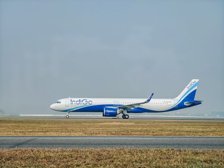 New Delhi, India: India's largest airline, IndiGo, has begun trial operations of an artificial intelligence-powered flight optimisation system aimed at reducing fuel consumption during one of the most fuel-intensive phases of flight take-off and climb. The airline has started testing SITA's OptiClimb solution across its Airbus fleet from June 25, marking a significant step in the adoption of advanced digital technologies to improve operational efficiency, reduce fuel burn, and lower carbon emissions. The initiative comes at a time when airlines worldwide are facing mounting pressure from rising fuel costs, sustainability targets, and increasing operational expenses. Fuel remains one of the largest cost components for airlines, making even small efficiency gains highly valuable across large fleets. Developed by aviation technology provider SITA, OptiClimb uses artificial intelligence, machine learning, aircraft-specific performance data, operational parameters, and real-time weather information to recommend the most fuel-efficient climb profile for each flight. Traditionally, aircraft follow relatively fixed climb procedures after take-off. Under the new system, pilots receive tailored speed recommendations based on factors such as aircraft weight, cruise altitude, atmospheric conditions, and actual aircraft performance. The objective is to optimise the climb phase without compromising safety or operational requirements. According to reports, the climb segment is among the most fuel-intensive portions of a flight because aircraft engines operate at high thrust settings during ascent. By adjusting climb speeds based on real-time conditions rather than relying solely on standard profiles, airlines can reduce fuel consumption significantly. IndiGo estimates the technology could save approximately 60 to 65 kilograms of fuel on every take-off. While the savings may appear modest on an individual flight, the impact becomes substantial when multiplied across thousands of daily operations. With IndiGo operating the largest fleet and flight network in India, cumulative annual fuel savings could translate into considerable reductions in operating costs and carbon emissions. The airline has reportedly spent several months working with SITA to integrate and prepare the system before launching operational trials. The move reflects a broader shift within the aviation industry toward data-driven flight optimisation. SITA's OptiFlight platform, which includes the OptiClimb module, is already used by airlines around the world to improve fuel efficiency during various phases of flight. According to SITA, the platform supports more than 2,500 aircraft globally and can help airlines reduce fuel consumption and emissions through aircraft-specific performance modelling, machine learning, and advanced weather forecasting. The technology forms part of a wider industry effort to achieve sustainability targets while mitigating the financial impact of volatile fuel prices. The adoption of AI-driven optimisation comes as Indian airlines continue to manage elevated aviation turbine fuel (ATF) costs. In recent months, carriers including IndiGo and Air India have adjusted capacity and schedules amid higher fuel prices and changing market conditions. Air India Group has already deployed SITA's OptiFlight climb optimisation technology and SITA eWAS weather solutions across portions of its fleet. The airline previously stated that the deployment could help save approximately 11,100 tonnes of fuel annually while reducing carbon emissions by around 35,000 tonnes per year. Industry experts believe AI-powered flight optimisation tools will increasingly become standard across commercial aviation as airlines seek to balance operational efficiency, environmental commitments, and profitability. For IndiGo, the OptiClimb trials represent another step in its ongoing efforts to improve fuel efficiency through technology and operational innovation. The carrier has historically implemented multiple fuel-saving initiatives, ranging from operational procedures to ground-efficiency measures. If the trials deliver the expected results, the airline could expand the technology across its Airbus fleet, potentially generating substantial long-term savings while supporting its sustainability objectives. As aviation enters a more data-driven era, artificial intelligence is increasingly moving from the back office into the cockpit, helping airlines make real-time operational decisions that directly influence fuel consumption, costs, and environmental performance.