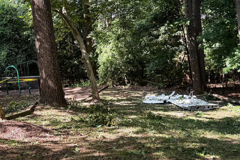 Bowie, United States: Three people were killed after a single-engine Piper PA-28-181 Archer II crashed into a wooded area near a residential neighborhood and playground in Bowie, Maryland, late on June 20, prompting a multi-agency overnight search and a federal investigation into the cause of the accident. According to Maryland State Police (MSP), the aircraft went down at approximately 11:30 p.m. local time in a wooded section of Archer Park near Scarlett Oak Court, just east of Washington, D.C. The aircraft, identified as a Piper PA-28-181 Archer II bearing registration N249WF, was operating a flight from Ocean City, New Jersey, to Montgomery County Airpark in Gaithersburg, Maryland. Authorities said the aircraft was believed to be associated with a Montgomery County-based flight school named Washington International Flight Academy and may have been conducting a training flight at the time of the accident. All three occupants onboard the pilot and two adult passengers were fatally injured. Emergency medical personnel pronounced them dead at the scene. Authorities have not yet publicly released their identities pending notification of next of kin. The crash occurred only a short distance from homes in a townhouse community and near a neighborhood playground. No injuries were reported among residents on the ground. "We are very fortunate that nobody else was injured in this crash," Maryland State Police spokesperson Elena Russo said during a press briefing. "Of course, it's an absolute tragedy that we've lost three individuals in this incident, but we're also very fortunate that nobody else in the neighboring residential area was hurt." A large-scale search operation was immediately launched involving Maryland State Police, Prince George's County Police Department, Anne Arundel County Police Department, Bowie city officials, and Prince George's County Fire and EMS personnel. Ground units and aviation assets searched through the night before locating the wreckage at approximately 3:45 a.m. on June 21. Officials said darkness, dense vegetation, and the absence of eyewitness reports complicated search efforts and delayed the discovery of the aircraft. Residents living near the crash site reported hearing a loud boom shortly before midnight. Some initially believed the sound was fireworks or distant thunder. Photographs and video from the scene showed debris scattered across a wooded area, with some wreckage reportedly landing near a playground and in residential backyards. "It was an absolutely tragic incident," Russo said. "It could have been even worse because of the proximity to a town home community in Bowie." Aviation enthusiasts familiar with local flight operations also assisted in narrowing down the aircraft's last known location using publicly available flight-tracking data. One flight instructor told local media that he and several others followed the aircraft's final radar track into the wooded area while first responders were searching for the wreckage. At present, investigators have not identified a cause for the crash. Authorities have not disclosed whether the pilot reported any emergency or technical difficulties before the accident. Online flight-tracking enthusiasts have suggested the aircraft may have transmitted a 7700 emergency squawk and experienced a loss of altitude before impact. However, those observations have not been confirmed by investigators and remain unofficial. The National Transportation Safety Board (NTSB) and the Federal Aviation Administration (FAA) have opened a formal investigation. The NTSB is leading the inquiry and is expected to examine the aircraft's maintenance history, pilot qualifications, weather conditions, flight track data, air traffic communications, and wreckage evidence. An NTSB investigator was expected to arrive at the crash site on June 21. Federal investigators have indicated that no preliminary conclusions regarding the cause of the accident are available at this stage. The wreckage remains secured as investigators continue documenting evidence and reconstructing the aircraft's final moments.
