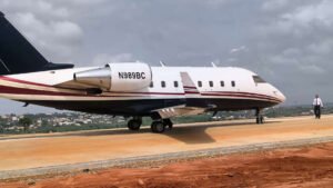 Lagos, Nigeria: The Nigeria Civil Aviation Authority (NCAA) has grounded a privately operated aircraft and suspended the operator's Permit for Non-Commercial Flight (PNCF) after the aircraft conducted an unauthorized flight to Lagos following an emergency landing near Asaba in Delta State. The aircraft involved was a Canadair CL-600-2B16 Challenger 601-3A, registration N989BC, owned and operated by Best Aircraft Deals LLC. The regulator announced the enforcement action in a statement issued on Wednesday by Director of Public Affairs and Consumer Protection Michael Achimugu, who confirmed that a full investigation has been launched into the occurrence. According to preliminary information released by the NCAA, the aircraft was attempting to land at Asaba Airport when the crew executed a missed approach at approximately 7:43 a.m. local time. The aircraft subsequently carried out an emergency landing on a roadway in the Ogwashi-Uku area, outside the airport environment. Authorities reported that all four crew members on board safely evacuated the aircraft after landing. No injuries were recorded, and the occupants were later transported to Asaba by road. While the emergency landing itself ended without casualties, the NCAA's concerns intensified after learning that the aircraft later departed the scene and flew to Lagos without obtaining the required regulatory authorization. According to the regulator, preliminary findings indicate that the aircraft took off from the location at approximately 11:02 GMT and returned to Lagos without prior approval from the authority. The NCAA further stated that Air Traffic Control was reportedly notified only after the aircraft had already become airborne. The authority described the action as a potential violation of the Nigerian Civil Aviation Regulations and immediately grounded the aircraft upon its arrival in Lagos pending the outcome of ongoing investigations. In addition, the flight crew has been placed under regulatory review while investigators examine the circumstances surrounding both the emergency landing and the subsequent unauthorized flight. As part of the enforcement measures, the NCAA suspended the operator's Permit for Non-Commercial Flight and ordered a comprehensive review of all operational, maintenance, airworthiness and flight-related records associated with the aircraft and operator. The authority has also notified the Nigerian Safety Investigation Bureau (NSIB) and is coordinating with the Nigerian Airspace Management Agency (NAMA) and other aviation stakeholders to establish the full sequence of events. The regulator stated that the actions were necessary to preserve aviation safety and ensure compliance with established operational procedures while the investigation remains underway.