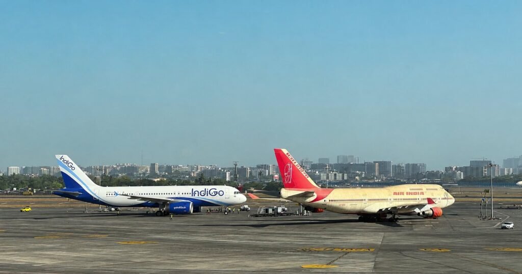 Ahmedabad, India: A potentially serious ground incident was averted at Ahmedabad's Sardar Vallabhbhai Patel International Airport after an Air India aircraft inadvertently entered an active taxiway following landing and came face-to-face with an IndiGo aircraft preparing for departure. Swift intervention by Air Traffic Control (ATC) prevented the situation from escalating, with both aircraft stopping safely before any collision occurred. The incident took place on the evening of June 24 while Air India flight AI2493, operating from Mumbai to Ahmedabad, was taxiing to its assigned parking stand after landing. According to Air India and aviation sources, the aircraft made an unintended turn while taxiing toward its designated bay, entering an active taxiway instead of following its assigned route. At the same time, IndiGo flight 6E5160, scheduled to operate from Ahmedabad to Mumbai, was taxiing for departure toward the runway. The unexpected movement brought the two Airbus A320-family aircraft onto the same taxiway, leaving them positioned directly opposite each other. According to officials, Air Traffic Control immediately instructed both flight crews to stop. The aircraft came to a halt with an estimated separation of around 200 metres, ensuring that no contact occurred between them. Authorities confirmed there were no injuries to passengers or crew and no damage to either aircraft. Following the incident, the Air India aircraft was assisted back to its designated parking bay with ground support, after which the IndiGo aircraft resumed taxiing and departed safely for Mumbai. The IndiGo flight subsequently landed safely at Chhatrapati Shivaji Maharaj International Airport in Mumbai. In an official statement, Air India acknowledged that flight AI2493 had taken an unintended turn during taxiing after landing at Ahmedabad on June 24. "We are aware of an incident where our flight AI2493 operating from Mumbai to Ahmedabad, after landing, inadvertently took a wrong turn during taxiing. There was no compromise on the safety of passengers or crew. The aircraft was subsequently moved to the correct parking bay with ground assistance," the airline said. Air India added that the matter had been reported to the Directorate General of Civil Aviation (DGCA), and an internal investigation had been initiated. IndiGo confirmed that its flight 6E5160 was taxiing for departure to Mumbai when another aircraft entered its taxi path. The airline said both aircraft were stopped immediately as a precaution in coordination with ATC. After the situation was resolved, the flight continued its departure and completed the journey safely. The Directorate General of Civil Aviation has been informed of the incident and has initiated an investigation to determine the circumstances that led to the taxiway deviation. Investigators are expected to examine the sequence of taxi instructions issued by ATC, cockpit communications, pilot adherence to taxi clearances, airport ground movement procedures and other operational factors that may have contributed to the incident. Authorities have not yet determined the cause of the wrong turn, and no findings have been released regarding whether the deviation resulted from pilot error, misunderstanding of taxi instructions, airport signage, or any other contributing factor.