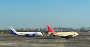 Ahmedabad, India: A potentially serious ground incident was averted at Ahmedabad's Sardar Vallabhbhai Patel International Airport after an Air India aircraft inadvertently entered an active taxiway following landing and came face-to-face with an IndiGo aircraft preparing for departure. Swift intervention by Air Traffic Control (ATC) prevented the situation from escalating, with both aircraft stopping safely before any collision occurred. The incident took place on the evening of June 24 while Air India flight AI2493, operating from Mumbai to Ahmedabad, was taxiing to its assigned parking stand after landing. According to Air India and aviation sources, the aircraft made an unintended turn while taxiing toward its designated bay, entering an active taxiway instead of following its assigned route. At the same time, IndiGo flight 6E5160, scheduled to operate from Ahmedabad to Mumbai, was taxiing for departure toward the runway. The unexpected movement brought the two Airbus A320-family aircraft onto the same taxiway, leaving them positioned directly opposite each other. According to officials, Air Traffic Control immediately instructed both flight crews to stop. The aircraft came to a halt with an estimated separation of around 200 metres, ensuring that no contact occurred between them. Authorities confirmed there were no injuries to passengers or crew and no damage to either aircraft. Following the incident, the Air India aircraft was assisted back to its designated parking bay with ground support, after which the IndiGo aircraft resumed taxiing and departed safely for Mumbai. The IndiGo flight subsequently landed safely at Chhatrapati Shivaji Maharaj International Airport in Mumbai. In an official statement, Air India acknowledged that flight AI2493 had taken an unintended turn during taxiing after landing at Ahmedabad on June 24. "We are aware of an incident where our flight AI2493 operating from Mumbai to Ahmedabad, after landing, inadvertently took a wrong turn during taxiing. There was no compromise on the safety of passengers or crew. The aircraft was subsequently moved to the correct parking bay with ground assistance," the airline said. Air India added that the matter had been reported to the Directorate General of Civil Aviation (DGCA), and an internal investigation had been initiated. IndiGo confirmed that its flight 6E5160 was taxiing for departure to Mumbai when another aircraft entered its taxi path. The airline said both aircraft were stopped immediately as a precaution in coordination with ATC. After the situation was resolved, the flight continued its departure and completed the journey safely. The Directorate General of Civil Aviation has been informed of the incident and has initiated an investigation to determine the circumstances that led to the taxiway deviation. Investigators are expected to examine the sequence of taxi instructions issued by ATC, cockpit communications, pilot adherence to taxi clearances, airport ground movement procedures and other operational factors that may have contributed to the incident. Authorities have not yet determined the cause of the wrong turn, and no findings have been released regarding whether the deviation resulted from pilot error, misunderstanding of taxi instructions, airport signage, or any other contributing factor.