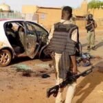 Niamey, Niger: At least 35 people were killed after heavily armed attackers launched a coordinated assault on Niger's main international airport and an adjoining military airbase in the capital Niamey on June 18, 2026, marking the second major attack on the strategic facility this year. According to Niger's Ministry of Defence, the attack left 11 members of the security forces and two civilians dead. Security forces repelled the assault, killing 22 attackers and arresting approximately 20 suspects. Weapons and ammunition were also seized during the operation. The attack targeted Diori Hamani International Airport and the adjacent military installation, a key security hub that hosts Niger's air force assets and serves as the headquarters of the joint military force formed by Niger, Mali and Burkina Faso under the Alliance of Sahel States (AES). Witnesses reported hearing sustained gunfire and explosions beginning around 6:00 a.m. local time. The fighting lasted for more than two hours as security forces battled the attackers around the airport complex. According to sources cited by Al Jazeera and AFP, some of the assailants arrived at a security checkpoint near the airport by taxi before engaging security personnel. Gunfire echoed across the area for hours as troops responded to the assault. Witnesses described scenes of panic around the airport, while soldiers later established checkpoints and conducted searches on roads leading to the facility. Four people were also wounded during the attack, according to preliminary figures released by the Defence Ministry. Despite the violence, Nigerien authorities said the airport remained secure and operational. In a statement broadcast on national television, the Defence Ministry said, "The international airport, which is fully secured, remains open to air traffic." The ministry added that a "large-scale operation" was underway to pursue those involved in the assault. Hours after the attack, Niger's National Civil Aviation Agency confirmed that airport operations had resumed normally. Responsibility for the attack was claimed by Jama'at Nusrat al-Islam wal-Muslimin (JNIM), an al-Qaeda-linked militant group that operates across the Sahel region. JNIM said it had carried out what it described as a "suicide attack" against Diori Hamani International Airport and a neighboring military base. The claim was published through the group's media outlet, Az-Zallaqa Foundation. The attack underscores the growing threat posed by jihadist groups across the Sahel, where al-Qaeda-linked and Islamic State-affiliated organizations continue to compete for territory and influence. The airport is considered one of Niger's most strategically important facilities. In addition to serving as the country's primary international gateway, the complex houses military aircraft, drones and air force infrastructure. It also serves as a command center for the Alliance of Sahel States, the regional bloc created by Niger, Mali and Burkina Faso following military takeovers in the three countries. The symbolism and military significance of the airport make it an attractive target for extremist groups seeking to challenge state authority. "The symbolism of the airport as headquarters for AES will drive intent by militants to target it," security analyst Beverly Ochieng of Control Risks told the Associated Press. The June 18 attack was the second major assault on the airport complex this year. On January 29, militants linked to Islamic State's Sahel Province launched a large-scale attack on the same facility, targeting military assets and drone infrastructure. Nigerien authorities said that the attack was repelled after fierce fighting. The latest assault reflects an evolving militant strategy in which extremist groups are increasingly expanding operations from remote rural regions into major urban centers. Ibrahim Yahaya Ibrahim, Deputy Project Director at the International Crisis Group, said the attack also reflects competition between rival jihadist factions operating in the region. "JNIM in Niger is trying to mark its territory. This is a message to the government but also to IS (Islamic State)," he said. Niger has faced escalating insecurity since the military seized power in a 2023 coup. Along with neighboring Mali and Burkina Faso, the country remains at the center of one of the world's deadliest jihadist insurgencies. The three military-led governments have shifted away from traditional Western security partnerships and strengthened cooperation with Russia while continuing operations against armed groups linked to al-Qaeda and Islamic State.