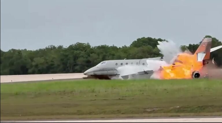 La Romana, Dominican Republic: Two crew members were killed after a private jet crashed while attempting an emergency landing at La Romana International Airport in the Dominican Republic on June 7, authorities confirmed. According to the Dominican Institute of Civil Aviation (IDAC), the aircraft involved was a U.S.-registered Gulfstream G200 executive jet operating a flight from La Romana to Austin, Texas. The aircraft was carrying only the pilot and co-pilot, with no passengers onboard. Preliminary information indicates the flight experienced a technical problem shortly after departure and requested to return to La Romana International Airport. Reports from local authorities suggest the crew declared an emergency while the aircraft was approximately 16 nautical miles southwest of the airport before turning back toward the airfield. Video footage circulating on social media shows the jet touching down during the emergency landing attempt before skidding along the runway. The aircraft then appeared to bounce and veer out of control before erupting into a large fireball. The impact and subsequent fire destroyed much of the aircraft. Both crew members sustained fatal injuries. Authorities have not yet publicly released their identities. Emergency response teams, including airport firefighters and rescue personnel, were dispatched immediately to the scene. Airport operations were temporarily suspended while emergency crews worked at the crash site and investigators began documenting evidence. Initial statements from officials indicate the aircraft encountered a malfunction before the attempted landing. Puerto Rico Department of Public Safety Secretary Arturo Garffer told local media that the aircraft had experienced problems during the landing phase, though he stressed that information remains preliminary pending a full investigation. The aircraft reportedly came down within the airport perimeter after losing stability during the emergency landing sequence. Images and video from the scene showed extensive fire damage and wreckage scattered near the runway area. The Gulfstream G200 is a twin-engine business jet capable of carrying between eight and 18 occupants depending on cabin configuration. The Dominican Civil Aviation Board and IDAC have launched an investigation to determine the exact cause of the accident. Investigators are expected to examine the aircraft's maintenance history, technical condition, flight data, communications with air traffic control, and the circumstances surrounding the reported malfunction. At the time of publication, authorities had not released the aircraft registration number, the names of the crew members, or any preliminary findings regarding the cause of the crash. The investigation remains ongoing.