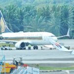 Kuala Lumpur, Malaysia: A Singapore Airlines (SIA) flight from Kuala Lumpur to Singapore was delayed by nearly six hours on June 21 after the aircraft operating an earlier sector suffered a tyre-related incident upon arrival in Malaysia, marking the second such occurrence involving the same route this month. According to Singapore Airlines, two tyres on a Boeing 737-8 operating Flight SQ114 from Singapore to Kuala Lumpur deflated after landing at Kuala Lumpur International Airport (KLIA) on June 21. The incident occurred after the aircraft had completed its arrival into Kuala Lumpur. There were no reports of injuries. Because the aircraft could not continue normal operations, it was towed to a remote parking bay. All 152 passengers and eight crew members onboard SQ114 disembarked via buses and were transported to the terminal. The affected aircraft had been scheduled to operate the return service, Flight SQ113, from Kuala Lumpur to Singapore later the same day. However, the tyre damage rendered the aircraft unavailable, forcing Singapore Airlines to dispatch a replacement aircraft from Singapore. As a result, SQ113, carrying 143 passengers and eight crew members, departed Kuala Lumpur at 8:27 p.m. local time instead of its scheduled 2:35 p.m. departure. The flight subsequently arrived in Singapore at 9:38 p.m. Passengers received multiple delay notifications throughout the afternoon. According to reports, the airline initially advised travelers that the departure had been postponed until 4:35 p.m. due to technical issues affecting the incoming aircraft. The flight was later delayed again, with Singapore Airlines citing adverse weather conditions in Singapore for the final postponement. Affected passengers were provided with refreshments, snack packs, meal vouchers and assistance with onward travel arrangements, including rebooking of connecting flights where necessary. Singapore Airlines apologized for the disruption, stating that passenger and crew safety remains its highest priority. The airline also confirmed that the damaged tyres had been replaced and that the aircraft would return to service after the necessary maintenance actions. The June 21 occurrence follows another tyre-related incident involving the same Singapore-Kuala Lumpur service on June 13. On that occasion, Flight SQ114, also operated by a Boeing 737 MAX 8, experienced a double tyre burst during landing at KLIA at approximately 1:27 p.m. local time. The aircraft became disabled on the runway, prompting airport authorities to temporarily close one of KLIA's three runways. The affected runway remained unavailable for about six hours while emergency crews and maintenance personnel worked to clear the aircraft and inspect the pavement. Malaysia Airports later confirmed that flight operations resumed after aviation authorities completed safety checks and granted clearance for reopening. Investigations and technical assessments are expected to determine whether the tyre failures resulted from operational factors, runway conditions, foreign object debris, maintenance issues, manufacturing defects or other causes.