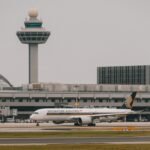 Singapore: An Indian national has been sentenced to six months in jail after molesting a Singapore Airlines flight attendant and later harassing her during a flight from Bangkok to Singapore earlier this year. The sentence was delivered by a Singapore court on June 22, 2026, bringing to a close a case that began with an in-flight incident aboard a Singapore Airlines service operating from Bangkok, Thailand, to Singapore on February 9, 2026. Akash Tiwari, 35, pleaded guilty to one charge of molestation and one charge of harassment. In addition to the jail term, the court ordered him to pay S$1,270.95 in compensation to the victim. Court records showed that he would serve an additional five days in jail if the compensation is not paid. According to court proceedings, Tiwari was travelling with four friends on the Singapore-bound flight. Prosecutors told the court that the group behaved rowdily during the journey and repeatedly waved frantically and laughed whenever female cabin crew members walked past their seats. The incident began before departure from Bangkok when a female flight attendant approached the group to confirm their meal selections. During the interaction, Tiwari stretched out his arm and brushed against the flight attendant's left upper thigh. Prosecutors said he laughed immediately afterward, while his friends also laughed at the incident. Disturbed by the behavior, the flight attendant reported the matter to the chief stewardess. To avoid further contact, she was reassigned to another aisle to continue serving passengers. However, the misconduct continued later in the flight while the flight attendant was collecting meal trays. Prosecutors said Tiwari deliberately used his left elbow to make contact with her buttock. The crew member immediately told him not to touch her. Instead of apologizing, Tiwari reportedly smirked at her. The victim became increasingly distressed and again warned him to stop. The flight attendant subsequently informed the chief stewardess, and both crew members confronted Tiwari regarding the incident. Court documents stated that he remained unapologetic and insisted he had done nothing wrong. As the aircraft began preparations for arrival in Singapore, the captain made an announcement instructing the cabin crew to prepare for landing. The flight attendant then proceeded to the galley while the chief stewardess informed her supervisor and the captain about the incident. According to prosecutors, Tiwari then followed the flight attendant into the galley area. He stood extremely close to her despite being told to stay away. When the victim attempted to create distance, he moved even closer and cornered her inside the confined space. The victim repeatedly instructed him to stop following her and to keep away. Instead, prosecutors said he persisted with the threatening behavior, causing her significant distress. The flight attendant eventually left the galley and moved into the aisle, only to discover that Tiwari was continuing to follow her. Witnesses in the cabin observed the confrontation. She sought assistance from the chief stewardess once again. By that stage, she was reportedly in tears, visibly frightened, and shaking. Following the report from the cabin crew, the flight captain notified authorities ahead of arrival. After the aircraft landed at Singapore Changi Airport, officers from the Airport Police Division conducted follow-up investigations and arrested Tiwari. Singapore Police said they were alerted to the incident at approximately 4:27 p.m. on February 9. The case first entered the court system on March 17, 2026, when Tiwari was formally charged with using criminal force to outrage the modesty of the victim and with causing harassment, alarm, or distress through threatening behavior. At the time, he indicated that he intended to contest the allegations and plead not guilty. A pre-trial conference was subsequently scheduled for March 26. Court documents alleged that Tiwari deliberately used his body to make contact with the victim's buttock area and later followed her into the galley, cornered her in the confined space, and continued pursuing her after she attempted to leave. A gag order was imposed throughout the proceedings to protect the identity of the victim. During sentencing proceedings, prosecutors highlighted Tiwari's lack of remorse, noting that he smirked when confronted and remained unapologetic despite the victim's visible distress. On June 22, 2026, the court sentenced Tiwari to six months' imprisonment and ordered compensation of S$1,270.95 to the victim, consisting of compensation for emotional trauma and related expenses. The case has drawn significant attention in Singapore because it involved misconduct against airline cabin crew while operating aboard an international commercial flight. Singapore authorities reiterated that offenders who commit acts of molestation, harassment, and threatening behavior will be dealt with firmly under the law, whether such conduct occurs on an aircraft or elsewhere.
