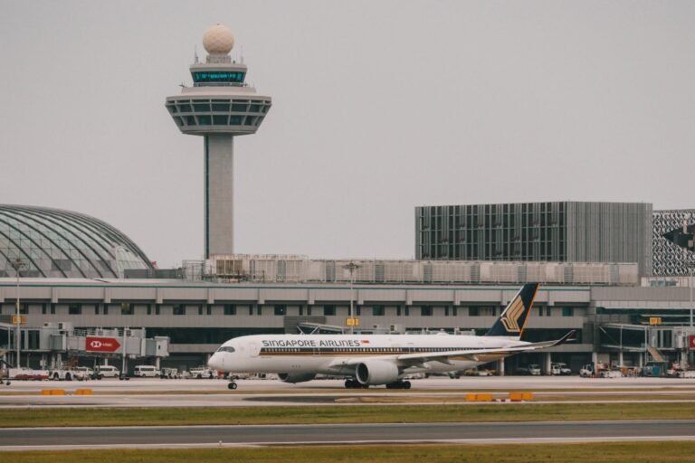 Singapore: An Indian national has been sentenced to six months in jail after molesting a Singapore Airlines flight attendant and later harassing her during a flight from Bangkok to Singapore earlier this year. The sentence was delivered by a Singapore court on June 22, 2026, bringing to a close a case that began with an in-flight incident aboard a Singapore Airlines service operating from Bangkok, Thailand, to Singapore on February 9, 2026. Akash Tiwari, 35, pleaded guilty to one charge of molestation and one charge of harassment. In addition to the jail term, the court ordered him to pay S$1,270.95 in compensation to the victim. Court records showed that he would serve an additional five days in jail if the compensation is not paid. According to court proceedings, Tiwari was travelling with four friends on the Singapore-bound flight. Prosecutors told the court that the group behaved rowdily during the journey and repeatedly waved frantically and laughed whenever female cabin crew members walked past their seats. The incident began before departure from Bangkok when a female flight attendant approached the group to confirm their meal selections. During the interaction, Tiwari stretched out his arm and brushed against the flight attendant's left upper thigh. Prosecutors said he laughed immediately afterward, while his friends also laughed at the incident. Disturbed by the behavior, the flight attendant reported the matter to the chief stewardess. To avoid further contact, she was reassigned to another aisle to continue serving passengers. However, the misconduct continued later in the flight while the flight attendant was collecting meal trays. Prosecutors said Tiwari deliberately used his left elbow to make contact with her buttock. The crew member immediately told him not to touch her. Instead of apologizing, Tiwari reportedly smirked at her. The victim became increasingly distressed and again warned him to stop. The flight attendant subsequently informed the chief stewardess, and both crew members confronted Tiwari regarding the incident. Court documents stated that he remained unapologetic and insisted he had done nothing wrong. As the aircraft began preparations for arrival in Singapore, the captain made an announcement instructing the cabin crew to prepare for landing. The flight attendant then proceeded to the galley while the chief stewardess informed her supervisor and the captain about the incident. According to prosecutors, Tiwari then followed the flight attendant into the galley area. He stood extremely close to her despite being told to stay away. When the victim attempted to create distance, he moved even closer and cornered her inside the confined space. The victim repeatedly instructed him to stop following her and to keep away. Instead, prosecutors said he persisted with the threatening behavior, causing her significant distress. The flight attendant eventually left the galley and moved into the aisle, only to discover that Tiwari was continuing to follow her. Witnesses in the cabin observed the confrontation. She sought assistance from the chief stewardess once again. By that stage, she was reportedly in tears, visibly frightened, and shaking. Following the report from the cabin crew, the flight captain notified authorities ahead of arrival. After the aircraft landed at Singapore Changi Airport, officers from the Airport Police Division conducted follow-up investigations and arrested Tiwari. Singapore Police said they were alerted to the incident at approximately 4:27 p.m. on February 9. The case first entered the court system on March 17, 2026, when Tiwari was formally charged with using criminal force to outrage the modesty of the victim and with causing harassment, alarm, or distress through threatening behavior. At the time, he indicated that he intended to contest the allegations and plead not guilty. A pre-trial conference was subsequently scheduled for March 26. Court documents alleged that Tiwari deliberately used his body to make contact with the victim's buttock area and later followed her into the galley, cornered her in the confined space, and continued pursuing her after she attempted to leave. A gag order was imposed throughout the proceedings to protect the identity of the victim. During sentencing proceedings, prosecutors highlighted Tiwari's lack of remorse, noting that he smirked when confronted and remained unapologetic despite the victim's visible distress. On June 22, 2026, the court sentenced Tiwari to six months' imprisonment and ordered compensation of S$1,270.95 to the victim, consisting of compensation for emotional trauma and related expenses. The case has drawn significant attention in Singapore because it involved misconduct against airline cabin crew while operating aboard an international commercial flight. Singapore authorities reiterated that offenders who commit acts of molestation, harassment, and threatening behavior will be dealt with firmly under the law, whether such conduct occurs on an aircraft or elsewhere.