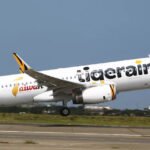 Hokkaido, Japan: A Tigerair Taiwan passenger aircraft operating a scheduled international flight from Taipei to Japan carried out an emergency diversion and landed safely at New Chitose Airport in Hokkaido after the crew received a smoke-related warning during flight. The aircraft, an Airbus A320 operating as Flight IT234, was en route from Taipei Taoyuan International Airport (TPE) to Sapporo’s New Chitose Airport (CTS) when cockpit systems indicated a potential smoke alert during the descent phase into Japanese airspace. The flight crew immediately initiated standard emergency procedures after receiving the warning indication. The pilots declared an emergency with Japanese air traffic control and requested priority landing at the nearest suitable airport. New Chitose Airport, a major international gateway in northern Japan, was selected as the diversion airport due to its proximity and full emergency handling capability. Emergency services at the airport were placed on standby as the aircraft approached, in line with standard aviation safety protocols for smoke-related alerts onboard commercial aircraft. The aircraft landed safely without further escalation of the situation. No injuries were reported among the approximately 179 passengers and crew members onboard. After landing, the aircraft was guided to a safe parking stand where passengers disembarked normally. Airport operations were briefly adjusted, with precautionary monitoring in place until the situation was fully stabilized. Initial reports described the incident as a “smoke warning” originating from the aircraft’s electronic or avionics compartment. However, early clarifications suggest there was no confirmed onboard fire or visible smoke in the cabin. The aircraft has been secured for technical inspection, and the cause of the warning remains under investigation.