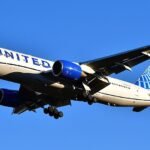 Houston, United States: A United Airlines Boeing 777-200ER operating Flight UA102 from Houston to Munich was forced to return to George Bush Intercontinental Airport (IAH) shortly after departure on June 19 after passengers and observers reported flames and loud bangs originating from the aircraft's right engine. The aircraft had departed Houston for Munich Airport (MUC) with 267 passengers and 13 crew members on board when the incident occurred moments after takeoff. According to multiple passenger accounts, a series of loud explosions or banging noises were heard from the right-side engine during the initial climb. Among those on board was former NFL quarterback Robert Griffin III, who later described the incident on social media. “The right engine of our plane flying out of Houston caught fire just after take off. We heard 15 straight loud bangs and immediately knew something was wrong. Thankfully the pilots were able to get us and every passenger back safe and sound with zero injuries. God is good,” Griffin wrote. According to aviation reports, the flight crew halted the climb at approximately 3,000 feet, shut down the affected engine, declared an emergency, and initiated a return to Houston. The aircraft subsequently landed safely at George Bush Intercontinental Airport, where emergency vehicles were standing by as a precaution. Passengers deplaned normally at the gate, and no injuries were reported among passengers or crew. In a statement, United Airlines confirmed the diversion, saying, “United flight 102 from Houston to Munich returned to George Bush Intercontinental Airport to address an engine issue. The flight landed safely and customers deplaned normally. We are arranging for another aircraft to take customers to their destination.” Flight-tracking data identified the aircraft as a Boeing 777-200ER. Aviation reports indicated the jet was powered by General Electric GE90 engines, with the incident involving the right engine. However, the exact cause of the malfunction has not yet been determined. United subsequently arranged a replacement aircraft for affected passengers, allowing the Munich-bound service to continue after a significant delay.