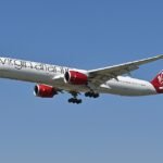 Halifax, Canada: A Virgin Atlantic Airbus A350 operating a scheduled flight from Toronto Pearson International Airport (YYZ) to London Heathrow Airport (LHR) diverted to Halifax Stanfield International Airport (YHZ) after crew members reported a smoke smell onboard while crossing the North Atlantic. The aircraft was operating Flight VS148, which departed Toronto late on Monday evening for the overnight journey to London. The Airbus A350 had begun its eastbound transatlantic crossing when crew members detected a smoke odor in the cabin, prompting them to initiate emergency procedures and divert the aircraft as a precaution. Flight-tracking data showed the aircraft squawking emergency code 7700 before turning toward Halifax, one of the primary diversion airports for transatlantic flights operating between North America and Europe. The aircraft landed safely at Halifax, where emergency services were positioned as a standard precaution following the emergency declaration. No injuries were immediately reported among passengers or crew. Virgin Atlantic had not released detailed information regarding the source of the smoke smell at the time of reporting. It also remained unclear whether the odor originated from an aircraft system, equipment, or another onboard source. Halifax Stanfield International Airport is frequently used as a diversion point for long-haul flights due to its strategic location on Canada's Atlantic coast and its capability to accommodate large widebody aircraft. Following the safe landing, the aircraft was expected to undergo technical inspections while the airline arranged assistance and onward travel options for affected passengers. Virgin Atlantic had not publicly disclosed the number of passengers and crew onboard the flight. The incident remains under review, and additional details are expected once inspections are completed and the airline releases further information.