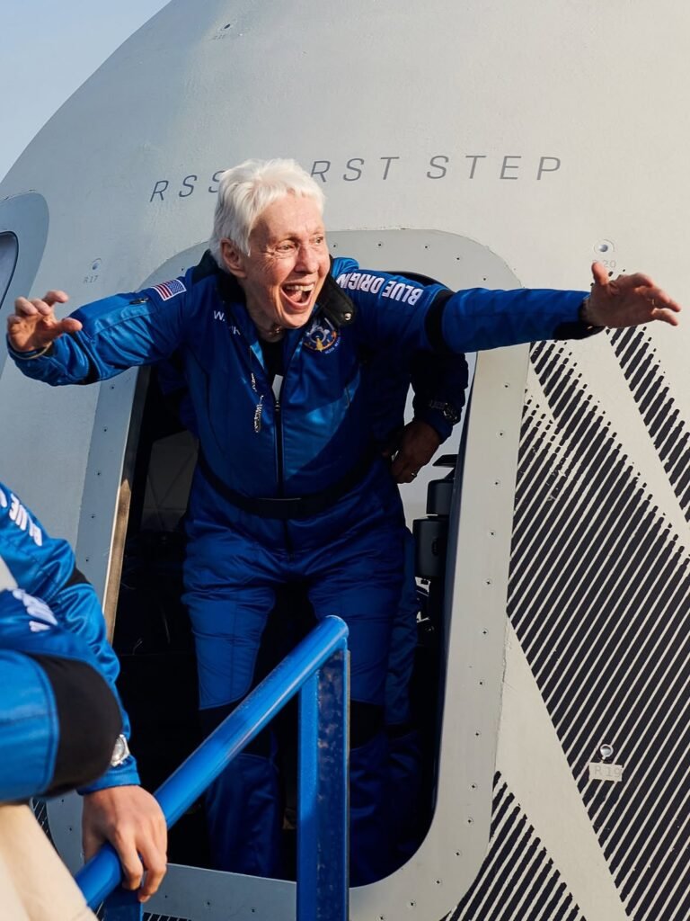 Mercury 13 Pioneer And Oldest Woman To Fly To Space Wally Funk Dies At 87 SEO DES: Wally Funk died at 87 from complications after falls and a leg infection, five years after becoming the oldest woman to fly into space SOCIAL: Pioneering American aviator and Mercury 13 astronaut trainee Wally Funk has died at 87 in Grapevine, Texas, She fulfilled her lifelong dream of reaching space in 2021 aboard Blue Origin's New Shepard, becoming the oldest woman ever to fly into space and the only Mercury 13 member to do so. Denied the chance to become a NASA astronaut despite passing the same tests as the Mercury 7 astronauts in 1961, Funk went on to become the FAA's first female inspector and the NTSB's first female air safety investigator. She fulfilled her lifelong dream of reaching space in 2021 aboard Blue Origin's New Shepard, becoming the oldest woman ever to fly into space and the only Mercury 13 member to do so. Her pioneering career, spanning more than seven decades and over 19,600 flight hours, helped pave the way for women in aviation and space exploration. Texas, United States: Trailblazing American aviator Wally Funk, whose lifelong pursuit of spaceflight made her a symbol of perseverance for generations of women in aviation, has died at the age of 87. Funk died on July 8, 2026, at her assisted living residence in Grapevine, Texas, after complications related to recent falls and a leg infection, according to her longtime caregiver and Grapevine City Council member Duff O'Dell. Best known as one of the Mercury 13 women who successfully completed the same rigorous astronaut screening tests as NASA's original Mercury astronauts in 1961, Funk spent more than seven decades breaking barriers in aviation despite being denied the opportunity to become a NASA astronaut because of her gender. Born in 1939, Funk developed a passion for flying at an early age and earned her pilot's license while still a teenager. She went on to build one of the most accomplished aviation careers in the United States, accumulating more than 19,600 flight hours and training over 3,000 pilots during her career. Some later estimates of her lifetime experience exceeded 30,000 flying hours, reflecting her continued flying and instruction over decades. In 1961, Funk volunteered for the privately funded astronaut research program conducted by aerospace physician Dr. William Randolph Lovelace II, which later became known as the Mercury 13. The group consisted of 13 women who passed the same demanding physical and psychological examinations administered to NASA's all-male Mercury 7 astronauts. At just 21 years old, Funk was the youngest participant in the program and reportedly outperformed many male astronauts in several tests. During one sensory deprivation experiment, she remained isolated for 10 hours and 35 minutes, setting a record at the time. Despite their impressive performances, the women were never admitted into NASA's astronaut corps because the agency required military test pilot experience, a qualification unavailable to women then and the program ended before its final phase. Although NASA began accepting women astronauts in the late 1970s, Funk's applications were rejected because she lacked an engineering degree and military test pilot credentials, despite her extensive aviation experience. Nevertheless, she continued to advocate for women in aviation while pursuing a distinguished flying career. Funk became the first female flight instructor at a U.S. military base, training Army personnel at Fort Sill, Oklahoma. She later became the Federal Aviation Administration's first female inspector and the National Transportation Safety Board's first female air safety investigator, investigating hundreds of aviation accidents and helping shape aviation safety in the United States. Her lifelong dream of reaching space was finally realized on July 20, 2021, when Blue Origin founder Jeff Bezos invited her to join the company's first crewed New Shepard mission. The four-person crew comprised Jeff Bezos, his brother Mark Bezos, Dutch student Oliver Daemen, and Wally Funk. The fully reusable New Shepard suborbital rocket launched from Blue Origin's Launch Site One near Van Horn, Texas, carrying the crew beyond the internationally recognized boundary of space before returning safely to Earth. At 82, Funk became the oldest person ever to travel into space, surpassing the record previously held by John Glenn. Although actor William Shatner later broke the overall age record, Funk remains the oldest woman ever to fly into space and the only member of the Mercury 13 to have reached space. Following her historic flight, Funk became an inspiration worldwide. Her enthusiasm after landing declaring she had waited decades for the opportunity and wanted to "go again" captured global attention. Reuters reported that she was affectionately described by then White House Press Secretary Jen Psaki as "America's new sweetheart" following the mission. Blue Origin paid tribute to Funk following her death, calling her "a pioneer in every sense of the word" whose determination inspired generations. NASA, aviation organizations and public officials also honored her enduring contributions to aviation, aerospace and gender equality. Grapevine officials described her life as proof that "dreams have no expiration date." Funk's legacy extends far beyond her historic spaceflight. Her decades as a pilot, instructor, investigator and aviation advocate helped open doors for women in professions that had long been closed to them. From passing astronaut tests in the early 1960s to finally reaching space six decades later, her life became a testament to resilience, determination and the pursuit of dreams despite institutional barriers.