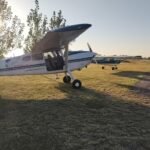 A 22-year-old student pilot safely landed a training aircraft after her flight instructor fell from the aircraft during a training flight in Argentina, in an incident that has shocked the country's aviation community and prompted an ongoing investigation. The accident occurred on 5 July 2026 near the town of Toledo in Córdoba Province. The training flight departed from Coronel Olmedo Aerodrome, where the Flying Parrot Córdoba flight school is based. On board were the student pilot and 42-year-old flight instructor Leandro Andrés Bertazzo, an experienced commercial pilot and instructor. According to Argentine authorities and local media, the student, who already held a Private Pilot Licence (PPL) but was continuing advanced flight training under supervision, was flying with Bertazzo in a Cessna 150, a two-seat training aircraft commonly used for flight instruction. During the flight, Bertazzo unexpectedly exited the aircraft while it was airborne. The exact circumstances surrounding how he left the aircraft remain under investigation, and officials have not yet determined whether the incident resulted from an accidental fall, a mechanical issue involving the aircraft's door or safety systems, or another cause. The student pilot retained control of the aircraft and, despite suddenly being alone on board, flew it back to Coronel Olmedo Aerodrome and landed safely without assistance. She immediately alerted personnel at the flight school, who notified emergency services and authorities. Search teams subsequently located Bertazzo's body in a rural field near Toledo, approximately 15 to 20 minutes after the student reported the incident. He was pronounced dead at the scene. Bertazzo had worked in aviation for around 10 years and had served as a flight instructor at Flying Parrot Córdoba for approximately four years. Colleagues described him as an experienced instructor, and the school's director, Eduardo Álvarez, said Bertazzo had completed another training flight earlier that day without any indication that something was wrong. Álvarez said the student later recounted that, moments before the incident, Bertazzo told her, "You know what you have to do," before removing his headset, placing his mobile phone aside, opening the aircraft door and leaving the aircraft. Authorities have not independently confirmed the student's account, and investigators are treating it as part of the ongoing inquiry. Investigators have seized the aircraft for examination and are reviewing its maintenance records, flight school documentation, operational procedures and any available communications made during the flight. They are also examining the aircraft's door and restraint systems to determine whether a mechanical malfunction could have contributed to the tragedy. While some Argentine media outlets have reported that investigators are also examining the possibility that Bertazzo intentionally exited the aircraft, judicial and aviation authorities have not announced any official conclusion regarding the cause of the incident. The investigation remains ongoing. The student pilot survived the incident without physical injuries and is expected to provide further testimony as investigators continue reconstructing the events leading up to one of the most unusual training-flight accidents reported in Argentina in recent years.
