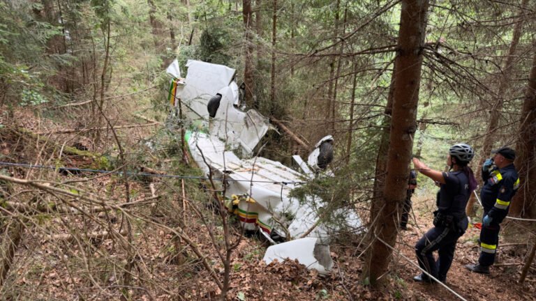 Gaming, Austria: The aircraft came down in a difficult-to-access area near Gaming, prompting a large-scale emergency response involving the police, fire brigade, ambulance services and two rescue helicopters. Rescue teams had to navigate rugged terrain to reach the wreckage. The single-engine aircraft The Piper PA-28 took off from Seitenstetten Airport, located about 40 kilometers from the scene of the accident. Shortly before noon, the machine lost altitude and fell into a densely forested and rocky area in the municipality of Gaming, near Mount Yocher (nearly 1900 meters above sea level). Authorities confirmed that all four occupants were on board when the aircraft crashed. The 47-year-old pilot and a woman of the same age died at the scene. A 15-year-old girl and a 41-year-old man were rescued from the wreckage with serious injuries. They were pulled from the rocky terrain with ropes and transported by helicopter to an ambulance. One of the injured was airlifted by rescue helicopter to a hospital in Linz, while emergency responders transported the second survivor for medical treatment. Officials have not released further updates on their conditions. According to preliminary, unconfirmed eyewitness accounts, the aircraft's engine emitted an unusual noise before the crash, suggesting a possible technical malfunction. The prosecutor's office has ordered a routine autopsy on the pilot as part of the investigation, while the wreckage is expected to be recovered from the mountainside using a specialized helicopter. Investigators have begun examining the wreckage, but the cause of the crash remains unknown. Gaming, a rural municipality in Lower Austria located near the Ötscher mountain region, is known for its heavily wooded and mountainous terrain, which complicated rescue efforts following the crash. The investigation is expected to continue as Austrian authorities work to identify the victims and establish the circumstances surrounding the accident.