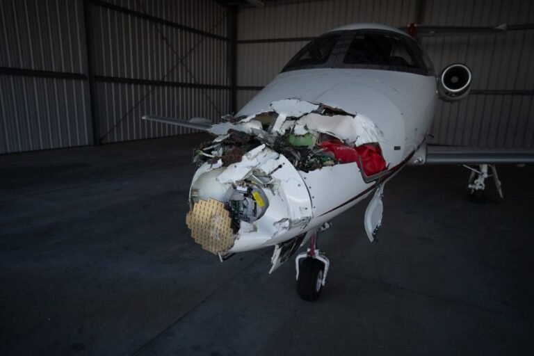 North Carolina, United States: A corporate business jet collided with a box truck while taxiing at Raleigh-Durham International Airport (RDU) in North Carolina on Wednesday afternoon, temporarily shutting down the airport's airfield, disrupting flight operations and prompting an investigation by federal authorities. The incident occurred on Taxiway C at approximately 2 p.m. local time on July 1, according to airport officials. The aircraft involved has been identified as a Nicholas Air Embraer EMB-500 Phenom 100 business jet, registered as N356N and operating as JTZ356, aviation records show. Airport officials confirmed that two occupants aboard the aircraft and the lone driver of the box truck escaped without injuries. Images from the scene showed the aircraft sustaining significant damage to its nose section, while emergency responders quickly secured the area following the collision. The damaged aircraft was later moved into a hangar as investigators began examining the incident. The accident forced RDU to close its airfield for nearly an hour, halting arriving and departing traffic before operations resumed at around 2:30 p.m. Airport spokesperson Stephanie Hawco confirmed that the airfield was reopened after emergency crews cleared the taxiway and determined it was safe to resume operations. Although the closure was brief, it caused widespread disruption across the airport's flight schedule. According to airport officials and flight tracking data, between 15 and 20 flights were diverted or delayed. Several inbound aircraft were rerouted to Charlotte Douglas International Airport, while others diverted to Greensboro and Washington Dulles International Airport. A Copa Airlines service originally bound for Raleigh was among the flights diverted to Dulles. Charlotte Douglas Airport later confirmed that six diverted aircraft were expected to refuel before returning to RDU. The disruption also affected departing passengers. A scheduled international flight to Germany departed approximately three hours late, while travelers reported extended waits as the temporary closure created a ripple effect across the airport's operations. One passenger told WRAL that he considered driving to Greensboro after his daughter's incoming flight was diverted but was later informed that the aircraft would eventually return to Raleigh. During the same period, airport officials also handled an unrelated event involving an incoming aircraft that reported a possible mechanical issue. The aircraft landed safely and was not connected to the taxiway collision. Flight instructor Steve Welsh told WRAL that aircraft generally have the right of way on taxiways and noted that business jets possess significant blind spots, making strict coordination between aircraft and ground vehicles essential. "In incidents where a vehicle hits an aircraft, the aircraft always has the right of way," Welsh said, adding that vehicles approaching from the side may not become visible to pilots until they are very close to the aircraft. RDU later issued a statement confirming normal operations had resumed. "RDU closed the airfield briefly earlier this afternoon after a general aviation aircraft and a box truck collided on a taxiway. There were no injuries, and the airfield has reopened to arriving and departing flights." Videos shared by witnesses on social media showed emergency vehicles surrounding the damaged aircraft while airport operations remained suspended during the response. According to airport statistics, Raleigh-Durham International Airport handles approximately 360 daily arrivals and departures served by 17 airlines. The airport recorded 5.6 million passengers in 2025, marking its busiest year on record. The National Transportation Safety Board (NTSB) has launched an investigation into the collision. Authorities have not yet determined the cause, and it remains unclear whether the incident resulted from pilot actions, vehicle operations, airport procedures or another contributing factor.