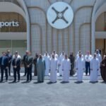 Dubai Certifies World's First Commercial eVTOL Vertiport Ahead Of Air Taxi Launch SEO DES: Developed by Skyports Infrastructure and Dubai's RTA, the vertiport will serve up to 170,000 passengers annually, boosting UAE's urban air mobility SOCIAL: Dubai has certified VDX, the world's first purpose-built commercial vertiport for electric vertical take-off and landing (eVTOL) aircraft, marking a major milestone in advanced air mobility. Developed by Skyports Infrastructure and Dubai's RTA, the facility will serve as the hub of Dubai's planned four-vertiport air taxi network, with commercial services expected to launch by the end of 2026 using Joby Aviation's all-electric aircraft. The project is expected to accommodate up to 170,000 passengers annually, significantly reduce travel times across the city, and position the UAE as a global leader in commercial urban air mobility Dubai, United Arab Emirates: Dubai has taken a significant step toward launching commercial electric air taxi services after the United Arab Emirates' General Civil Aviation Authority (GCAA) certified the world's first purpose-built commercial vertiport for electric vertical take-off and landing (eVTOL) aircraft operations. The certification of VDX, developed by Skyports Infrastructure in partnership with Dubai's Roads and Transport Authority (RTA), establishes the regulatory foundation for commercial air taxi operations in the emirate and positions the UAE as the first country to certify a dedicated commercial vertiport for passenger eVTOL services. The approval is being regarded as a landmark achievement for advanced air mobility (AAM), demonstrating that the infrastructure and regulatory framework required for safe commercial electric air taxi operations are now in place. Located adjacent to Dubai International Airport (DXB), VDX will serve as the flagship hub of Dubai's planned air taxi network. Three additional vertiports are currently under development at Downtown Dubai, Dubai Marina and Palm Jumeirah, creating what is expected to become the world's first integrated commercial air taxi network. Commercial operations remain on track to begin before the end of 2026, subject to final aircraft certification and operational approvals. The newly certified four-storey vertiport spans approximately 3,100 square metres and has been purpose-built to support high-frequency passenger operations. The facility features two dedicated eVTOL take-off and landing pads, rapid charging infrastructure for electric aircraft, passenger processing facilities, security screening areas and operational support infrastructure designed to integrate seamlessly with Dubai's wider transportation network. Once fully operational, VDX is expected to accommodate up to 170,000 passengers annually, reinforcing Dubai's strategy of integrating advanced air mobility into its existing public transport ecosystem. According to the GCAA, the certification confirms that both the physical infrastructure and operational framework meet the authority's safety and regulatory requirements for commercial eVTOL operations. Officials described the approval as a defining moment for the future of aviation, noting that the UAE is establishing international benchmarks for advanced air mobility rather than simply preparing for emerging technologies. Saif Mohammed Al Suwaidi, Director General of the GCAA, described the certification as "a historic achievement for the UAE and a defining moment for the future of aviation." "The UAE is not only preparing for the future of aviation; it is actively shaping it and establishing new international benchmarks for Advanced Air Mobility," Al Suwaidi said, adding that the approval demonstrates the country's commitment to enabling safe, sustainable and commercially viable next-generation aviation. Skyports Infrastructure said the certification represents one of the final infrastructure milestones before passenger services can begin. Duncan Walker, Chief Executive Officer of Skyports Infrastructure, said, "With VDX now certified and construction of the wider Dubai Air Taxi Network progressing at pace, we are one step closer to launching commercial air taxi operations, and unlocking a new era of safe, efficient and sustainable urban transport." Walker added that achieving certification validates years of collaboration between Skyports, the GCAA, the RTA and industry partners to create one of the world's first fully regulated commercial eVTOL ecosystems. The air taxi network will initially be operated using Joby Aviation's all-electric aircraft, which is designed to carry a pilot and four passengers. The aircraft has a maximum speed of approximately 320 km/h (200 mph) and a range of about 160 km (100 miles) while producing zero operational emissions and substantially lower noise levels than conventional helicopters. The network is expected to reduce travel times dramatically, with journeys between Dubai International Airport and Palm Jumeirah projected to take around 10 minutes, compared with approximately 45 minutes by road, depending on traffic conditions. The certification also reflects Dubai's broader ambition to become a global leader in urban air mobility. The emirate has spent several years developing the regulatory framework, infrastructure, aircraft partnerships and operational ecosystem required to support commercial eVTOL services. Previous milestones have included approval of the vertiport design, commencement of construction and successful flight demonstrations of electric air taxis as the city works toward launching one of the world's first commercial passenger eVTOL networks. With the certification now secured, attention shifts to completing the remaining vertiports, final aircraft certification and operational readiness ahead of the planned commercial launch in 2026. Industry observers view the approval as one of the most significant infrastructure milestones achieved globally in the transition from eVTOL flight testing to routine commercial passenger operations, reinforcing Dubai's ambition to pioneer the next generation of sustainable urban aviation.