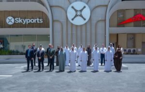 Dubai Certifies World's First Commercial eVTOL Vertiport Ahead Of Air Taxi Launch SEO DES: Developed by Skyports Infrastructure and Dubai's RTA, the vertiport will serve up to 170,000 passengers annually, boosting UAE's urban air mobility SOCIAL: Dubai has certified VDX, the world's first purpose-built commercial vertiport for electric vertical take-off and landing (eVTOL) aircraft, marking a major milestone in advanced air mobility. Developed by Skyports Infrastructure and Dubai's RTA, the facility will serve as the hub of Dubai's planned four-vertiport air taxi network, with commercial services expected to launch by the end of 2026 using Joby Aviation's all-electric aircraft. The project is expected to accommodate up to 170,000 passengers annually, significantly reduce travel times across the city, and position the UAE as a global leader in commercial urban air mobility Dubai, United Arab Emirates: Dubai has taken a significant step toward launching commercial electric air taxi services after the United Arab Emirates' General Civil Aviation Authority (GCAA) certified the world's first purpose-built commercial vertiport for electric vertical take-off and landing (eVTOL) aircraft operations. The certification of VDX, developed by Skyports Infrastructure in partnership with Dubai's Roads and Transport Authority (RTA), establishes the regulatory foundation for commercial air taxi operations in the emirate and positions the UAE as the first country to certify a dedicated commercial vertiport for passenger eVTOL services. The approval is being regarded as a landmark achievement for advanced air mobility (AAM), demonstrating that the infrastructure and regulatory framework required for safe commercial electric air taxi operations are now in place. Located adjacent to Dubai International Airport (DXB), VDX will serve as the flagship hub of Dubai's planned air taxi network. Three additional vertiports are currently under development at Downtown Dubai, Dubai Marina and Palm Jumeirah, creating what is expected to become the world's first integrated commercial air taxi network. Commercial operations remain on track to begin before the end of 2026, subject to final aircraft certification and operational approvals. The newly certified four-storey vertiport spans approximately 3,100 square metres and has been purpose-built to support high-frequency passenger operations. The facility features two dedicated eVTOL take-off and landing pads, rapid charging infrastructure for electric aircraft, passenger processing facilities, security screening areas and operational support infrastructure designed to integrate seamlessly with Dubai's wider transportation network. Once fully operational, VDX is expected to accommodate up to 170,000 passengers annually, reinforcing Dubai's strategy of integrating advanced air mobility into its existing public transport ecosystem. According to the GCAA, the certification confirms that both the physical infrastructure and operational framework meet the authority's safety and regulatory requirements for commercial eVTOL operations. Officials described the approval as a defining moment for the future of aviation, noting that the UAE is establishing international benchmarks for advanced air mobility rather than simply preparing for emerging technologies. Saif Mohammed Al Suwaidi, Director General of the GCAA, described the certification as "a historic achievement for the UAE and a defining moment for the future of aviation." "The UAE is not only preparing for the future of aviation; it is actively shaping it and establishing new international benchmarks for Advanced Air Mobility," Al Suwaidi said, adding that the approval demonstrates the country's commitment to enabling safe, sustainable and commercially viable next-generation aviation. Skyports Infrastructure said the certification represents one of the final infrastructure milestones before passenger services can begin. Duncan Walker, Chief Executive Officer of Skyports Infrastructure, said, "With VDX now certified and construction of the wider Dubai Air Taxi Network progressing at pace, we are one step closer to launching commercial air taxi operations, and unlocking a new era of safe, efficient and sustainable urban transport." Walker added that achieving certification validates years of collaboration between Skyports, the GCAA, the RTA and industry partners to create one of the world's first fully regulated commercial eVTOL ecosystems. The air taxi network will initially be operated using Joby Aviation's all-electric aircraft, which is designed to carry a pilot and four passengers. The aircraft has a maximum speed of approximately 320 km/h (200 mph) and a range of about 160 km (100 miles) while producing zero operational emissions and substantially lower noise levels than conventional helicopters. The network is expected to reduce travel times dramatically, with journeys between Dubai International Airport and Palm Jumeirah projected to take around 10 minutes, compared with approximately 45 minutes by road, depending on traffic conditions. The certification also reflects Dubai's broader ambition to become a global leader in urban air mobility. The emirate has spent several years developing the regulatory framework, infrastructure, aircraft partnerships and operational ecosystem required to support commercial eVTOL services. Previous milestones have included approval of the vertiport design, commencement of construction and successful flight demonstrations of electric air taxis as the city works toward launching one of the world's first commercial passenger eVTOL networks. With the certification now secured, attention shifts to completing the remaining vertiports, final aircraft certification and operational readiness ahead of the planned commercial launch in 2026. Industry observers view the approval as one of the most significant infrastructure milestones achieved globally in the transition from eVTOL flight testing to routine commercial passenger operations, reinforcing Dubai's ambition to pioneer the next generation of sustainable urban aviation.