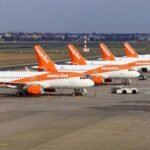 London, United Kingdom: British low-cost carrier easyJet has agreed in principle to a sweetened takeover proposal from the U.S.-based investment firm Castlelake, valuing the airline at up to £5.5 billion (US$7.3 billion). If completed, the transaction would take one of Europe's largest budget airlines private and mark one of the aviation sector's biggest deals in recent years. The latest proposal values easyJet at 690 pence per share, representing a 73% premium over the airline's closing share price on 29 May 2026, the day Castlelake publicly disclosed its interest under UK takeover rules. The easyJet board said the revised proposal is at a level that it would be minded to recommend to shareholders if a firm offer is made, marking a significant shift after previously rejecting four lower bids. The agreement follows more than a month of negotiations. Castlelake initially revealed its interest in late May before progressively increasing its offers from 560p, 600p, 625p, and 650p per share, all of which were rejected by easyJet's board as materially undervaluing the airline. After rejecting the fourth proposal, the airline granted Castlelake limited access to commercial information, allowing the investor to conduct due diligence and improve its offer. Under the UK Takeover Code, Castlelake must submit a firm intention to make an offer by 3 August 2026, or withdraw unless an extension is granted by the UK's takeover regulator. The current agreement is therefore not yet a binding acquisition. The takeover would be one of the most significant ownership changes in European aviation. Headquartered at London Luton Airport, easyJet operates one of Europe's largest short-haul networks, serving more than 150 airports across the continent with a fleet of over 360 Airbus aircraft, comprising the Airbus A319, A320, A320neo and A321neo families. The airline is also a major customer of Airbus with a substantial outstanding aircraft order book supporting its long-term fleet renewal programme. Analysts believe these aircraft assets, together with valuable airport slots, are among the primary attractions for Castlelake. Industry analysts note that Castlelake is not a traditional airline operator but is a major aviation investor with extensive interests in aircraft leasing and aviation finance. The Minneapolis-based investment firm manages approximately US$38 billion in assets, leases aircraft to airlines including Qantas and Etihad Airways, and previously participated in the restructuring of Scandinavian Airlines (SAS). Analysts believe Castlelake's expertise in aircraft financing makes easyJet's fleet, aircraft order book and airport slot portfolio particularly attractive. Beyond its fleet, easyJet owns some of Europe's most valuable take-off and landing slots, particularly at capacity-constrained airports including London Gatwick, Paris Charles de Gaulle, Paris Orly and Geneva, assets that would be extremely difficult to replicate under current airport capacity restrictions. The airline's rapidly expanding easyJet Holidays business is also viewed as an important strategic asset capable of generating higher-margin revenue. One of the biggest hurdles facing the transaction is compliance with European Union airline ownership rules, which require EU airlines to remain majority owned and effectively controlled by EU nationals. To satisfy those regulations, Castlelake has proposed a structure in which it would own 49% of the acquisition vehicle while the remaining 51% would be held by European investors. The consortium includes former easyJet Chief Operating Officer and former Malaysia Airlines CEO Peter Bellew and aviation executive Mark Breen, former CEO of Arajet. Despite the board's support for the latest proposal, investors continue to price in execution risk. Following the announcement, easyJet shares climbed around 10%, reaching their highest level in almost four years. However, the stock continued trading well below the proposed 690p offer price, reflecting uncertainty surrounding financing, regulatory approvals, shareholder backing and the possibility of competing bids. Analysts at JPMorgan and other investment firms have said that while the revised proposal significantly improves the likelihood of a successful transaction, important details regarding funding arrangements and governance remain undisclosed. Some market observers have also suggested that rival airline groups could still emerge, although regulatory constraints would make any acquisition by another major European airline difficult. Lufthansa has been mentioned as a potential suitor but is currently focused on other acquisitions, while Wizz Air has also been cited, though analysts question whether it has the financial capacity for such a purchase. The position of easyJet founder Stelios Haji-Ioannou, whose family controls approximately 15% of the airline, is expected to be closely watched. He has not publicly indicated whether he intends to support the proposal, and his stance could prove influential during the shareholder approval process. The proposed acquisition comes against a challenging backdrop for the airline industry. Higher jet fuel prices, geopolitical tensions affecting energy markets, and softer consumer demand have weighed on airline profitability in recent months. easyJet had previously argued that earlier takeover proposals were "highly opportunistic", contending that its share price had been temporarily depressed by market conditions and did not reflect the company's medium-term earnings potential or strategic value. If completed, the acquisition would represent one of the largest private equity investments in European commercial aviation and could reshape the competitive landscape among the continent's low-cost carriers, including Ryanair, Wizz Air and easyJet. The coming weeks are expected to determine whether Castlelake can secure regulatory clearance, financing and shareholder approval before the August deadline.