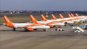 London, United Kingdom: British low-cost carrier easyJet has agreed in principle to a sweetened takeover proposal from the U.S.-based investment firm Castlelake, valuing the airline at up to £5.5 billion (US$7.3 billion). If completed, the transaction would take one of Europe's largest budget airlines private and mark one of the aviation sector's biggest deals in recent years. The latest proposal values easyJet at 690 pence per share, representing a 73% premium over the airline's closing share price on 29 May 2026, the day Castlelake publicly disclosed its interest under UK takeover rules. The easyJet board said the revised proposal is at a level that it would be minded to recommend to shareholders if a firm offer is made, marking a significant shift after previously rejecting four lower bids. The agreement follows more than a month of negotiations. Castlelake initially revealed its interest in late May before progressively increasing its offers from 560p, 600p, 625p, and 650p per share, all of which were rejected by easyJet's board as materially undervaluing the airline. After rejecting the fourth proposal, the airline granted Castlelake limited access to commercial information, allowing the investor to conduct due diligence and improve its offer. Under the UK Takeover Code, Castlelake must submit a firm intention to make an offer by 3 August 2026, or withdraw unless an extension is granted by the UK's takeover regulator. The current agreement is therefore not yet a binding acquisition. The takeover would be one of the most significant ownership changes in European aviation. Headquartered at London Luton Airport, easyJet operates one of Europe's largest short-haul networks, serving more than 150 airports across the continent with a fleet of over 360 Airbus aircraft, comprising the Airbus A319, A320, A320neo and A321neo families. The airline is also a major customer of Airbus with a substantial outstanding aircraft order book supporting its long-term fleet renewal programme. Analysts believe these aircraft assets, together with valuable airport slots, are among the primary attractions for Castlelake. Industry analysts note that Castlelake is not a traditional airline operator but is a major aviation investor with extensive interests in aircraft leasing and aviation finance. The Minneapolis-based investment firm manages approximately US$38 billion in assets, leases aircraft to airlines including Qantas and Etihad Airways, and previously participated in the restructuring of Scandinavian Airlines (SAS). Analysts believe Castlelake's expertise in aircraft financing makes easyJet's fleet, aircraft order book and airport slot portfolio particularly attractive. Beyond its fleet, easyJet owns some of Europe's most valuable take-off and landing slots, particularly at capacity-constrained airports including London Gatwick, Paris Charles de Gaulle, Paris Orly and Geneva, assets that would be extremely difficult to replicate under current airport capacity restrictions. The airline's rapidly expanding easyJet Holidays business is also viewed as an important strategic asset capable of generating higher-margin revenue. One of the biggest hurdles facing the transaction is compliance with European Union airline ownership rules, which require EU airlines to remain majority owned and effectively controlled by EU nationals. To satisfy those regulations, Castlelake has proposed a structure in which it would own 49% of the acquisition vehicle while the remaining 51% would be held by European investors. The consortium includes former easyJet Chief Operating Officer and former Malaysia Airlines CEO Peter Bellew and aviation executive Mark Breen, former CEO of Arajet. Despite the board's support for the latest proposal, investors continue to price in execution risk. Following the announcement, easyJet shares climbed around 10%, reaching their highest level in almost four years. However, the stock continued trading well below the proposed 690p offer price, reflecting uncertainty surrounding financing, regulatory approvals, shareholder backing and the possibility of competing bids. Analysts at JPMorgan and other investment firms have said that while the revised proposal significantly improves the likelihood of a successful transaction, important details regarding funding arrangements and governance remain undisclosed. Some market observers have also suggested that rival airline groups could still emerge, although regulatory constraints would make any acquisition by another major European airline difficult. Lufthansa has been mentioned as a potential suitor but is currently focused on other acquisitions, while Wizz Air has also been cited, though analysts question whether it has the financial capacity for such a purchase. The position of easyJet founder Stelios Haji-Ioannou, whose family controls approximately 15% of the airline, is expected to be closely watched. He has not publicly indicated whether he intends to support the proposal, and his stance could prove influential during the shareholder approval process. The proposed acquisition comes against a challenging backdrop for the airline industry. Higher jet fuel prices, geopolitical tensions affecting energy markets, and softer consumer demand have weighed on airline profitability in recent months. easyJet had previously argued that earlier takeover proposals were "highly opportunistic", contending that its share price had been temporarily depressed by market conditions and did not reflect the company's medium-term earnings potential or strategic value. If completed, the acquisition would represent one of the largest private equity investments in European commercial aviation and could reshape the competitive landscape among the continent's low-cost carriers, including Ryanair, Wizz Air and easyJet. The coming weeks are expected to determine whether Castlelake can secure regulatory clearance, financing and shareholder approval before the August deadline.