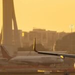 New Delhi, India: India is considering a policy change that could allow airport operators to own and operate airlines, potentially opening the door for major airport companies such as Adani Group and GMR Airports Ltd. to establish their own carriers. The proposal is being discussed within the Ministry of Civil Aviation and could mark a significant shift in India's aviation policy. Under the existing rules, operators of airports in Delhi and Mumbai are barred from holding more than a 10% stake in any airline. Any relaxation or waiver of the ownership restrictions would require legal clearance from the Law Ministry and approval from the Union Cabinet led by Prime Minister Narendra Modi The potential policy change comes as India's domestic aviation market has become increasingly concentrated around IndiGo and Air India, which together control nearly 90% of domestic capacity. The government is reportedly examining whether allowing airport operators to enter the airline business could bring additional competition and reduce the dominance of the two leading carriers. If the restrictions are eased, the Adani Group, whose airport arm operates Mumbai airport and seven other airports, and GMR Airports, which manages New Delhi airport and four additional airports in India, could potentially establish or acquire airlines. However, the proposal also raises concerns about possible conflicts of interest. Airport operators that also own airlines could potentially give their own carriers preferential access to prime airport slots, creating a new imbalance in the market. The issue of fair and non-discriminatory access to airport infrastructure could therefore become an important consideration if the government proceeds with the policy change. The Ministry of Civil Aviation had not immediately responded to an emailed request for comment at the time of reporting. The discussions come against the backdrop of a major consolidation in India's airline industry over the past decade. The collapse of Jet Airways India Ltd. and Go Airlines India Ltd., along with the merger of Vistara and AirAsia India under the Tata Group, has reduced the number of significant competitors in the market. While Akasa Air, SpiceJet Ltd. and smaller regional airlines continue to operate, IndiGo and Air India have emerged as the dominant players. Concerns about market concentration were further highlighted during IndiGo's operational crisis in December, when the airline, which carries more than 60% of India's domestic passenger traffic, cancelled thousands of flights, mainly because of pilot shortages. The disruption affected air travel across the country and prompted Indian Railways to operate special trains for stranded passengers. Even if airport operators are permitted to launch airlines, aircraft availability could remain a major obstacle for new entrants. A global shortage of commercial aircraft, combined with delivery delays at Airbus SE and Boeing Co., continues to constrain airline expansion plans. Pandemic-era supply-chain disruptions have also contributed to the limited availability of new aircraft. International experience with airport-airline joint ownership offers a mixed picture. In the United States, strict public-ownership rules governing major airports and Federal Aviation Administration revenue-diversion laws effectively prevent local governments from directing airport revenues into airline ventures. In the European Union, joint airport and airline ownership is technically permitted, but strict antitrust enforcement makes such arrangements difficult to operate in practice. The potential policy change comes as India prepares for a major expansion of its aviation infrastructure. The country plans to double its number of airports to 350 by 2047, while the International Air Transport Association (IATA) forecasts an additional 425 million passengers by 2044, which would bring passenger numbers to nearly three times their 2024 levels. The proposal could therefore reshape the competitive landscape of India's aviation sector, but it remains at the discussion stage. Any move to allow airport operators to own airlines would need to address concerns around competition, airport slot allocation and regulatory safeguards before becoming government policy.
