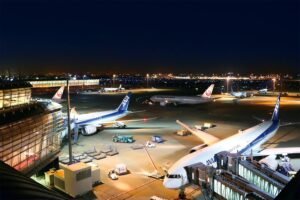 Tokyo, Japan: Japan's two largest airlines, Japan Airlines (JAL) and All Nippon Airways (ANA), have raised fuel surcharges on international passenger tickets purchased during July and August 2026, with charges exceeding ¥65,000 (around US$400) on some long-haul routes despite a sharp decline in jet fuel prices across Asia. The increase, which took effect on July 1, reflects the airlines' long-standing fuel surcharge calculation methodology that relies on historical average fuel prices rather than prevailing market rates. Both carriers revise their international fuel surcharges every two months. According to JAL, the revised surcharge is based on the average Singapore kerosene-type jet fuel price during April and May 2026, when fuel averaged US$178.21 per barrel. Since then, jet fuel prices have fallen substantially, dropping to US$113 per barrel on July 2, according to LSEG data. The decline follows an unprecedented spike that saw prices surge to a record US$242 per barrel in late March amid heightened geopolitical tensions in the Middle East. Because the surcharge calculation uses a two-month averaging mechanism with a lag, the recent decline in fuel prices will not be reflected until the next revision. As a result, passengers purchasing tickets in July and August will continue to pay significantly higher fuel surcharges despite easing fuel markets. JAL said the surcharge could have been even higher if not for financial support provided by the Japanese government to offset soaring energy costs resulting from the conflict involving Iran. Under the airline's pricing formula, the April-May average fuel price would have placed the surcharge in a higher pricing band. However, government mitigation measures reduced the applicable surcharge level, preventing passengers from paying the maximum allowable amount. For the July-August ticketing period, JAL's highest one-way fuel surcharge is ¥65,000 for flights between Japan and North America (excluding Hawaii), Europe, the Middle East and Oceania. Similar surcharge levels have also been introduced by ANA. The increase marks a sharp rise in travel costs over recent months. According to ANA's published surcharge tables, fuel levies on routes connecting Japan with Hawaii, India and Indonesia have more than tripled since the outbreak of the Iran conflict, increasing from US$94 in April to US$310 in July. JAL's surcharge structure reflects similar increases across comparable international routes. Although crude oil and jet fuel prices have retreated considerably from their March highs, the depreciation of the Japanese yen has continued to add pressure on airline operating costs. The yen fell to a 40-year low against the U.S. dollar earlier this week, making dollar-denominated fuel purchases more expensive for Japanese carriers and pushing the value of the highest surcharge to approximately US$400. JAL calculates its fuel surcharge using two key variables: the average price of Singapore kerosene-type jet fuel and the average exchange rate between the Japanese yen and the U.S. dollar during the applicable assessment period. For the July-August revision, the airline used an average exchange rate of ¥158.85 per U.S. dollar, translating the fuel price into a yen-denominated benchmark used to determine the surcharge band. The airlines review international fuel surcharges every two months, meaning the significant decline in fuel prices recorded during June and July is expected to be reflected in the September-October surcharge revision. If fuel prices remain near current levels, passengers purchasing tickets during that period are expected to benefit from lower fuel surcharges. The surcharge increase comes as international travelers to Japan are already facing higher travel-related costs introduced on July 1. Japan increased its international departure tax from ¥1,000 to ¥3,000 (approximately US$18) per passenger, while visa fees rose from ¥3,000 to ¥15,000 (around US$92), marking the first increase in visa charges since 1978. The combined effect of higher fuel surcharges, increased departure taxes and revised visa fees is expected to raise the overall cost of international travel to and from Japan during the peak summer travel season, even as global aviation fuel prices continue to decline. According to JAL, the current surcharge levels remain temporary and will continue to be reviewed under its bi-monthly pricing mechanism based on prevailing fuel market conditions and exchange rates.