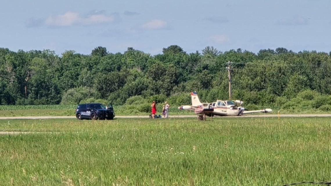Beechcraft Bonanza Skids Off Runway After Landing Gear Malfunction In Minnesota