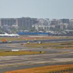 Mumbai, India: A potentially catastrophic runway collision was averted at Mumbai's Chhatrapati Shivaji Maharaj International Airport (CSMIA) on the night of July 8, 2026, after an Air India flight bound for Delhi was forced to abort its take-off roll when an Air India Express aircraft was still occupying the same runway following its landing, according to multiple media reports. The incident occurred on one of the airport's active runways during routine flight operations. According to aviation sources cited by several media outlets, the Air India aircraft had already begun accelerating for departure after receiving take-off clearance when its crew noticed an Air India Express aircraft ahead on the runway. The Air India Express flight had landed moments earlier but had not yet vacated the runway. Realising the runway was not clear, Air Traffic Control (ATC) immediately instructed the Air India crew to reject the take-off. The pilots carried out a rejected take-off (RTO), bringing the aircraft safely to a halt before reaching the Air India Express aircraft. The prompt response by both the cockpit crew and ATC prevented what could have become one of the most serious runway incidents at India's busiest airport. No passengers or crew members were injured in the incident, and neither aircraft sustained any reported damage. Airport operations continued after the aircraft were safely separated. While authorities have not officially disclosed the flight numbers involved, reports indicate that the departing aircraft was an Air India service from Mumbai to Delhi, while the other aircraft belonged to Air India Express and had just completed its landing at Mumbai. Initial information suggests the Air India Express aircraft had not vacated the runway before the departing Air India flight commenced its take-off roll, raising questions over runway occupancy and the sequencing of aircraft movements. Aviation authorities are expected to examine ATC clearances, communication between controllers and flight crews, runway occupancy procedures and the exact timeline of events to determine how both aircraft came to be on the same runway simultaneously. Earlier last month, on June 24, 2026, another face-to-face aircraft incident occurred at Ahmedabad's Sardar Vallabhbhai Patel International Airport when an Air India Airbus A320 arriving from Mumbai took a wrong turn while taxiing after landing and entered an active taxiway, where it came nose-to-nose with an IndiGo aircraft preparing for departure. ATC immediately halted both aircraft, no injuries or damage were reported, and the DGCA launched an investigation into the incident