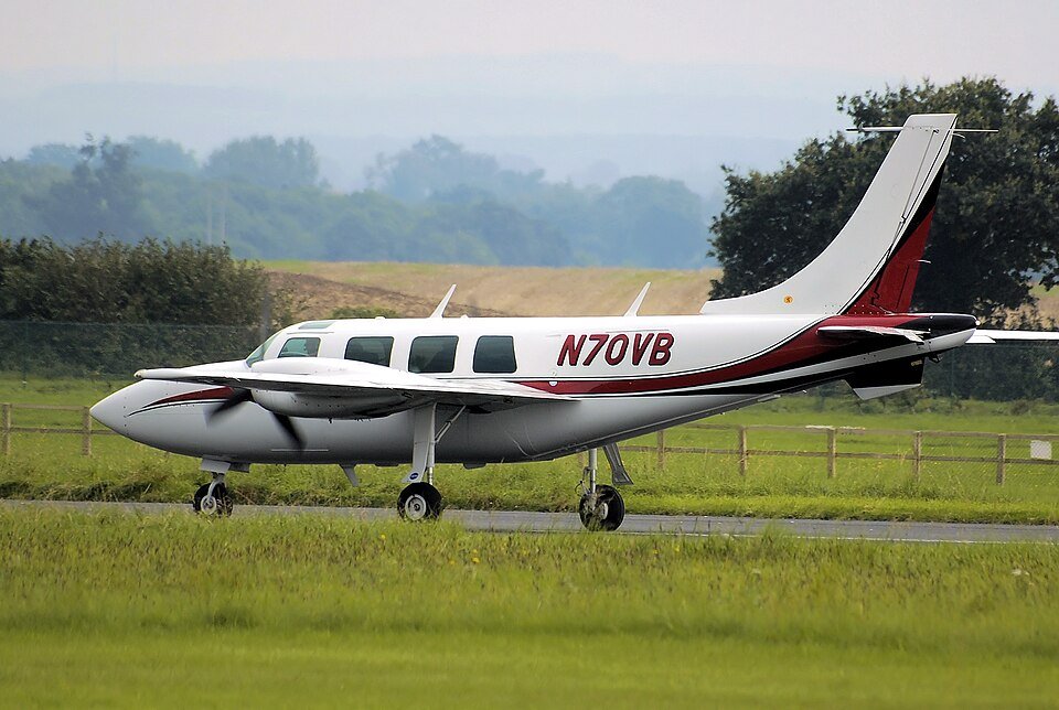 Harrietstown, United States: Three people were killed after a twin-engine Piper Aerostar crashed into a wooded area moments after departing Adirondack Regional Airport in northern New York late Monday night, marking the third aircraft accident reported in the Adirondacks within a week and prompting an investigation by the National Transportation Safety Board (NTSB). According to the New York State Police, the aircraft involved was a 1976 Piper Aerostar, a high-performance twin-engine airplane. Preliminary information indicates the aircraft departed Adirondack Regional Airport in Harrietstown at approximately 10:36 p.m. EDT on July 13, 2026. Shortly after becoming airborne, while climbing to an estimated altitude of only 100 feet above the ground, communication with the aircraft was lost. State Police said they were notified at approximately 11:15 p.m. of a downed aircraft near Hearf's Way and State Route 186, close to the airport. A multi-agency search operation involving state troopers, local emergency responders and other agencies was immediately launched to locate the missing airplane. Search crews later located the wreckage in a heavily wooded area between McMaster Road and State Route 186, northwest of Saranac Lake. Officials said the aircraft had been destroyed by the impact and a subsequent post-crash fire, leaving little of the airplane intact. The Federal Aviation Administration (FAA) confirmed that the aircraft was carrying three people, the pilot and two passengers and that all three died in the crash. Authorities have not yet released the identities of the victims pending family notification. Flight tracking data reviewed by several media outlets showed that the aircraft had arrived in the Saranac Lake area earlier on Monday before departing again later that evening from Adirondack Regional Airport. The airplane was registered to Jasper Air LLC, a company based in Toms River, New Jersey. The FAA said the aircraft crashed under unknown circumstances, and investigators have not yet identified what caused the loss of control or why communication ceased almost immediately after takeoff. At this stage, no evidence has been released indicating whether weather, mechanical issues, pilot actions or other factors contributed to the accident. Residents living near the crash site described hearing loud noises shortly before emergency crews arrived. Speaking to local television station WPTZ, resident Jodie Wells recalled the frightening moments after the impact. "We both flew out of bed and ran outside. I could hear some bangs and loud popping. It was scary. It was loud." She added, "We have been sad and out of sorts ever since." Another resident, William Cole, said the sounds initially resembled a thunderstorm. "It definitely sounded almost identical to thunder." According to local reports, a nearby home's doorbell camera reportedly captured the sound of the crash, although authorities have not indicated whether the footage will form part of the investigation. The crash also forced authorities to temporarily close a section of the Adirondack Rail Trail between McMaster Road and Route 186, restricting access for walkers and cyclists while investigators examined the accident scene and documented the wreckage. The closure remained in effect on Tuesday as investigative work continued. The National Transportation Safety Board has assumed responsibility for the investigation, with assistance from the FAA. The agency's investigation is expected to include a review of the aircraft's maintenance history, pilot qualifications, weather conditions, airport surveillance information, communications records and any available flight tracking data before determining the probable cause of the accident. No distress call or emergency declaration has been reported, and officials have not confirmed whether the aircraft experienced any mechanical malfunction before communication was lost. The investigation remains in its early stages, and authorities have cautioned that it may take months before a probable cause is established.