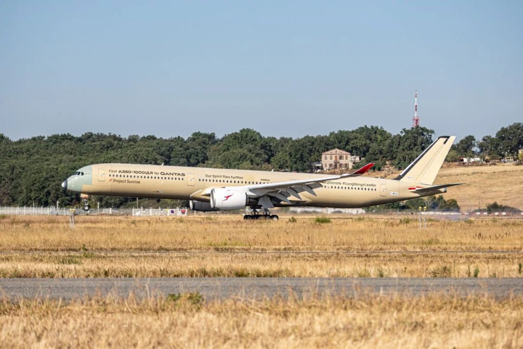 Airbus Completes Longest-Ever A350-1000 ULR Development Flight Ahead Of Project Sunrise SEO DES: Airbus' A350-1000 ULR test aircraft completed a record 24-hour, 24-minute nonstop development flight covering 12,460 nautical miles from Melbourne to Toulouse SOCIAL: Airbus’ A350-1000 ULR test aircraft MSN707 completed a record 24-hour-24-minute nonstop development flight from Melbourne, Australia, to Toulouse, France, covering 12,460 nautical miles. The flight was part of Airbus’ two-part development programme supporting Qantas’ Project Sunrise ultra-long-haul operations. The test evaluated the aircraft’s fuel-management systems, rear centre tank, cabin comfort, air-conditioning and new twin Flight Crew Rest Compartment. Pilots also followed specialised fatigue-management procedures, while Qantas pilots gained experience flying the A350-1000 ULR variant. The flight involved Airbus and Qantas pilots and flight-test engineers, with the aircraft following a route across the Pacific, North America and the Atlantic. The mission is expected to help validate the A350-1000 ULR for future nonstop commercial services connecting Australia with Europe and North America. Toulouse, France: Airbus has completed the longest flight ever flown by its A350-1000 ULR flight-test aircraft MSN707, with the specially instrumented MSN707 flying nonstop from Melbourne, Australia, to Toulouse, France, for 24 hours and 24 minutes. The aircraft covered 12,460 nautical miles (23,075 km or 14,338 miles) before landing in Toulouse on the morning of July 28, 2026. The flight was part of a two-part development flight-test programme. On July 23, MSN707 departed Toulouse on its longest point-to-point flight to Melbourne. A few days later, the aircraft began its return journey to Toulouse, carrying two Qantas guest pilots alongside the Airbus test crew. Airbus said the return flight was technically classified as a development test rather than a certification flight. The programme is designed to demonstrate the A350-1000ULR's ability to complete a 23-hour block-time mission. Block time runs from the release of the parking brake at departure until the aircraft reaches its arrival stand and is intended to provide sufficient operational margin around the planned 21-hour-40-minute flight time for Qantas' forthcoming Project Sunrise routes, including time for holding, diversion and taxiing. The aircraft is powered by two Rolls-Royce Trent XWB-97 engines and features an additional rear centre tank (RCT) with a 20,900-litre fuel capacity. The tank is designed to support ultra-long-range operations covering almost 10,000 nautical miles. During the flight, Airbus used the fully fueled RCT to validate remaining test points and assess fuel-management systems, while also evaluating cabin comfort and air-conditioning performance. Airbus Test Pilot Xavier Pepin, who served as captain on the record-setting return leg, said the first, approximately 20-hour leg was used to stabilise various cabin air-temperature settings for accurate measurements. The return flight then allowed the team to address backup test points that could not be completed during the first leg. The flight also evaluated the A350-1000ULR's new twin Flight Crew Rest Compartment. The specially designed facility has two separate sections with individual entrances, allowing pilots to access their respective rest areas without disturbing one another during airline operations. However, because the compartments were occupied by ventilation-measurement equipment during the test, the crew instead used the aircraft's eight-berth rear cabin-crew rest compartment for sleeping. The return flight from Melbourne followed a route across the Pacific toward Los Angeles, over the United States and Canada, and across the Atlantic south of Greenland before passing over the UK and continuing to southern France. Airbus selected a more northerly Atlantic routing to avoid potential air-traffic-control issues that could arise if published airline tracks were not updated before departure, potentially resulting in mismatched flight plans. Fatigue management was another key element of the ultra-long-range test. Airbus said pilots worked four-hour shifts but rotated every two hours, creating a two-hour overlap between the incoming and outgoing pilots. The arrangement was intended to support detailed handovers and maintain situational awareness throughout the 20- to 23-hour missions. On the return flight, at least one Airbus test pilot remained in a pilot seat whenever a Qantas pilot occupied the other seat, as Airbus retained operational responsibility for the mission. The schedule also allowed the Qantas pilots to take the controls at designated times. Both were already qualified on the A350 but were experiencing the A350-1000 ULR variant for the first time. The return flight was commanded by Airbus Test Pilot Xavier Pepin. Two Qantas pilots, Captain Andrew Coull and Captain David Summergreene, joined the mission, while one Airbus pilot from the outbound crew disembarked. Five pilots were therefore aboard for the return leg: three Airbus pilots and the two Qantas pilots. The two Test-Flight Engineers, Laurent Rossignol and Nicolas Granier, and three Flight-Test Engineers, Tuan Do, Alexia Plummet and Jaime Angoloti, remained on board for the return flight. The outbound leg had been led by Airbus Test Pilot Vincent Sibelle, who served as captain and was responsible for the overall mission organisation. The other Airbus pilots were Xavier Pepin, Josef Bayoud and Chetan Takalkar. The two Test-Flight Engineers monitored aircraft systems from the cockpit, while the three Flight-Test Engineers worked from stations in the main cabin, coordinating tests including cabin-comfort and fuel monitoring. The MSN707 test aircraft first flew on June 2, 2026, and is equipped with specialised instrumentation for the development programme. The latest flight is intended to help validate the aircraft's capabilities and systems ahead of its planned use for Qantas' Project Sunrise ultra-long-haul operations. The flight also attracted significant public attention. Reuters reported that more than 3.6 million people tracked the aircraft online, making it the second-most-followed flight ever on Flightradar24. The test demonstrated the potential of the A350-1000 ULR to support nonstop commercial services linking Australia's east coast with destinations in Europe and North America. The Melbourne-Toulouse development flight marks a major milestone in the testing of an aircraft designed to make some of the world's longest commercial passenger flights possible. Airbus' latest test programme is focused not only on endurance and fuel management but also on cabin conditions, crew-rest arrangements and operational procedures required for missions lasting more than 20 hours.