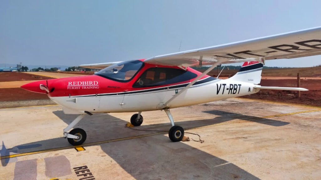 DGCA Bars Redbird Flight Academy Admissions Until Aug 2027 Over Regulatory Violations SEO DES: DGCA took its second major action against Redbird since 2023 over training delays, fee revisions, inadequate refunds and student restrictions SOCIAL: The Directorate General of Civil Aviation (DGCA) has barred Redbird Flight Training Academy from admitting new students until August 31, 2027, following multiple complaints from trainee pilots and a July 8 inspection that uncovered regulatory violations. The regulator cited prolonged training delays, revised fee structures, inadequate refunds, and restrictions imposed on students unwilling to accept new agreements. While Redbird will continue training its existing 435 active students under a mandated 70:30 flying-hour allocation, the academy remains under increased regulatory scrutiny after this became the second major enforcement action against it since 2023. New Delhi, India: The Directorate General of Civil Aviation (DGCA) has prohibited Redbird Flight Training Academy, regarded as South Asia's largest flight training organisation, from admitting fresh students into its pilot training programmes until August 31, 2027, citing multiple regulatory violations, prolonged training delays, fee-related disputes, and findings from a recent inspection. The order, issued on July 16, 2026, follows an enforcement process initiated under the Civil Aviation Requirements (CAR), Section 7, Series D, Part I. According to the regulator, the action was prompted by multiple complaints received from trainee pilots and the findings of a DGCA inspection conducted at the academy's facilities on July 8. Redbird Flight Training Academy operates training bases at Baramati in Maharashtra, Kalaburagi and Belagavi in Karnataka, Lilabari in Assam, and Seoni in Madhya Pradesh. The academy is widely recognised as South Asia's largest flight training organisation and has played a significant role in training commercial pilots for India's rapidly expanding aviation sector. According to the DGCA order, regulatory action was initiated against the academy for five primary reasons. These include prolonged delays in completing flight training, unilateral revision of flying charges to ₹3,000 per flying hour citing increased aviation fuel costs, inadequate and disproportionate refund of fees to trainees, execution of revised agreements imposing additional financial obligations on students, and the alleged denial of access to training facilities for trainees who refused to accept the revised contractual terms. During the spot inspection on July 8, DGCA officials also identified multiple discrepancies in the academy's operations. Based on the findings and complaints received, the regulator concluded that immediate corrective measures were necessary to safeguard the interests of trainee pilots and ensure compliance with applicable aviation training regulations. The order states that Redbird currently has 435 active trainee pilots and 92 inactive trainees enrolled across its training network. Under existing DGCA norms governing Flight Training Organisations, the number of trainee pilots should not exceed 10 students per aircraft, ensuring adequate aircraft availability and timely completion of training. While imposing the admission ban, the DGCA directed the academy to prioritise the completion of training for existing students. As part of the order, Redbird has been instructed to allocate flying hours in a 70:30 ratio, with 70% of available flying hours reserved for students enrolled up to 2024 and the remaining 30% allocated to students admitted during 2025 and later. The regulator said this measure is intended to address the backlog of trainees whose programmes have experienced significant delays. The latest enforcement action marks the second major regulatory intervention against Redbird in less than three years. In October 2023, the DGCA suspended the academy's flying operations for two months after it was linked to five aviation safety incidents within a six-month period. That suspension required the academy to undertake corrective measures before resuming operations. Responding to the latest order, Karan Mann, Senior Manager at Redbird Flight Training Academy, confirmed that the academy had received the DGCA directive. "We have more than 500 students presently and have 43 aircraft. We had placed an order for ten more aircraft and they are expected to arrive shortly. Due to global tensions, they have been delayed. We have plans for the future, including opening new bases across India shortly, including in Uttar Pradesh," Mann said. The academy indicated that fleet expansion remains part of its long-term growth strategy despite the admission restriction. However, until the DGCA lifts the prohibition or the specified period expires, Redbird will not be permitted to admit any new students into its pilot training programmes. The order reflects the regulator's increasing focus on ensuring that India's rapidly growing flight training sector maintains adequate infrastructure, transparent fee practices, and sufficient aircraft capacity as demand for commercial pilot training continues to rise. With Indian airlines collectively placing orders for hundreds of new aircraft and requiring thousands of additional pilots over the coming years, the DGCA has intensified oversight of Flight Training Organisations to ensure training standards and student welfare are not compromised.