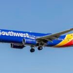 South Carolina, United States: A Southwest Airlines Boeing 737-800 operating Flight WN4761 from Orlando International Airport (MCO) to Manchester-Boston Regional Airport (MHT) diverted to Charleston International Airport (CHS) on Monday, July 20, after the flight crew detected indications of a suspected fuel leak while cruising over South Carolina. No injuries were reported among the passengers or crew. Flight WN4761 departed Orlando International Airport at 8:54 a.m. ET from Terminal A, Gate 125, on a scheduled nonstop service to Manchester, New Hampshire. The aircraft climbed normally for approximately one hour before reaching a cruising altitude of 37,000 feet over South Carolina. The aircraft involved was an 11-year-old Boeing 737-8H4, registered as N8662F. While the aircraft was at cruise altitude, the crew identified indications of a possible fuel leak and declared an emergency by transmitting the 7700 transponder code. The code is the internationally recognized general emergency squawk used by flight crews to alert air traffic control that an aircraft requires immediate priority handling. Following the emergency declaration, air traffic control cleared the aircraft for an expedited descent and arranged for the flight to divert to Charleston International Airport. The Boeing 737-800 subsequently landed safely on Runway 15, with emergency response vehicles standing by as a precaution. No injuries were reported among those onboard. The precise nature of the fuel leak indication remains unclear. It has not been established whether the aircraft experienced an actual structural or mechanical fuel leak or whether the warning resulted from a sensor or valve-related anomaly. The aircraft remained at Charleston after the diversion, where maintenance personnel began a detailed inspection to determine the root cause of the suspected fuel leak indication. Southwest Airlines had not publicly disclosed the cause of the issue or confirmed when the Boeing 737-800, N8662F, would return to service at the time of the report. Southwest arranged a replacement aircraft to continue the disrupted service. A newer Boeing 737 MAX 8, registered as N8881L, was dispatched to Charleston to transport the affected passengers to Manchester-Boston Regional Airport. Passengers reportedly waited approximately four hours on the ground before boarding the replacement aircraft. The flight eventually continued to Manchester, arriving about five hours later than its originally scheduled arrival time of 11:50 a.m. ET.