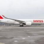 SWISS Flight Airbus A330 Diverted To Bangor After Smoke Reported Aboard The Aircraft SEO DES: Smoke was detected in the forward section of Business Class; FAA preliminarily reported a cockpit fire, but the smoke source remains unconfirmed SOCIAL: SWISS Flight LX16 from Zurich to New York JFK diverted to Bangor International Airport in Maine on July 27 after smoke was reportedly detected aboard. The Airbus A330 was carrying 208 people, and all passengers and crew landed safely. SWISS said the smoke was of unknown origin in the forward Business Class section, while the FAA preliminarily said the crew reported a cockpit fire. The aircraft landed on Runway 33, where emergency responders inspected it but found no signs of fire or excessive heat. The runway was temporarily closed for over 30 minutes, causing some flight delays. SWISS said the aircraft would undergo a thorough inspection and that it would not speculate on the cause until the checks were completed, while arrangements were made for passengers to continue their journey to New York. Bangor, United States: A Swiss International AirLines Airbus A330 operating Flight LX16 from Zurich to New York's John F. Kennedy International Airport made an emergency diversion to Bangor International Airport in Maine on Monday, July 27, after smoke was reported aboard the aircraft. The flight, carrying 208 passengers and crew, landed safely in Bangor at around noon local time. The aircraft was an Airbus A330, and emergency crews were placed on standby before it arrived at the airport. According to Swiss International Air Lines, the diversion was prompted by smoke of unknown origin detected in the forward section of the Business Class cabin. The airline said its pilots decided to land without delay and declare an emergency, allowing air traffic control to give the aircraft priority to land. The situation was also described differently in preliminary information released by the Federal Aviation Administration. The FAA said the flight crew had reported a cockpit fire before landing. The agency cautioned that the information was preliminary and subject to change. The airline, meanwhile, said the exact source of the smoke had not been identified. The aircraft was cruising at about 32,000 feet and was roughly 100 nautical miles southeast of Bangor when the crew diverted toward the airport. The crew reportedly initially reported smoke of unknown origin before subsequently telling air traffic control that there was an active fire in the cockpit that they were unable to extinguish. The pilots reportedly opened the cockpit door to allow smoke to escape, after which the smoke situation changed and was also noticed in the passenger cabin. The crew proceeded with the emergency diversion and landed on Runway 33 at Bangor International Airport. After landing, the aircraft stopped and shut down its engines while emergency responders assessed the situation. Firefighters entered the aircraft and inspected the interior, including equipment intended to detect heat. No signs of fire or excessive heat were found, and the source of the smoke remained undetermined. Passengers told local media that they noticed an electrical-type smell during the flight. One passenger said the smell appeared to be coming from the area of a seat, although this has not been established as the cause of the incident. Passengers also reported that the oxygen masks did not deploy and that they were not required to evacuate the aircraft on the runway. All 208 people aboard were reported safe, and no injuries were reported. The aircraft was subsequently inspected, while SWISS worked with authorities and Bangor International Airport to arrange onward travel for passengers to New York. The emergency landing temporarily closed the runway at Bangor International Airport for a little over 30 minutes, causing delays to other flights. The runway was reopened at about 12:30 p.m., according to an airport spokesperson. SWISS spokesperson Michael Pelzer said the airline understood that such a diversion could be unsettling for passengers and said teams in Switzerland and the United States were working to arrange onward travel. The airline also said the aircraft would undergo a thorough inspection by its experts and that it would not speculate on the cause of the smoke until the investigation and inspection were complete. The FAA said it would investigate the incident. The aircraft's emergency diversion was resolved without further incident, with all passengers and crew safely on the ground in Bangor.