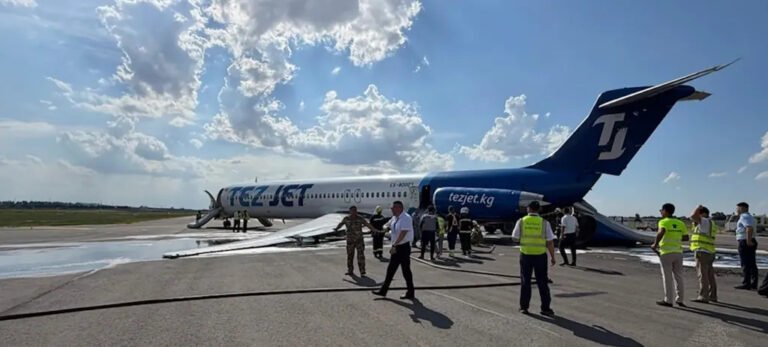 Bishkek, Kyrgyzstan: A TezJet McDonnell Douglas MD-83 carrying 181 people suffered a dramatic landing gear collapse during its takeoff roll at Manas International Airport in Bishkek, Kyrgyzstan, on Tuesday, July 7, forcing an emergency evacuation and temporarily shutting down the country's busiest airport. All passengers and crew escaped safely, with no fatalities or serious injuries reported, although several occupants sustained minor cuts, bruises and abrasions while evacuating via emergency slides. The aircraft was operating scheduled domestic flight K9117 from Bishkek to Osh when its left main landing gear collapsed while accelerating for departure on Runway 26. Airport authorities said the pilots were able to reject the takeoff because the aircraft was still travelling at a relatively low speed. After coming to a stop, the aircraft leaned sharply onto its left side, causing the left wing to scrape the runway and rupture, resulting in a jet fuel leak. Emergency crews, including airport firefighters, responded immediately as fuel spilled onto the runway. Despite the leak, there were no reports of a post-incident fire. The flight crew initiated an emergency evacuation using inflatable escape slides, allowing all 181 including 152 adults, 11 teenagers, and 18 children occupants to leave the aircraft safely. Authorities said several passengers suffered minor abrasions, cuts and bruises during the evacuation, but none required treatment for life-threatening injuries. No official breakdown of passengers by adults, children or infants has been released. Images from the scene showed extensive damage to the MD-83. The aircraft came to rest tilted onto its left wing, while the lower empennage (tail section) was torn away during the incident. Debris and spilled fuel were visible around the aircraft as emergency personnel secured the area. According to the state airport operator, Airports of Kyrgyzstan, Manas International Airport was temporarily closed following the occurrence while emergency responders removed the aircraft and ensured the runway was safe for operations. The airport later began restoring normal flight movements after the scene was secured. The aircraft involved was a McDonnell Douglas MD-83, a twin-engine narrow-body airliner from the MD-80 family. Aviation Safety Network identified the aircraft as operating TezJet Flight K9117 and reported that the incident occurred during the takeoff roll after the left-hand main landing gear collapsed. The MD-80 family, introduced in the 1980s, continues to serve with a limited number of operators worldwide despite its age. As of publication, neither TezJet nor Kyrgyz aviation authorities have announced the cause of the landing gear failure. An investigation has been launched to determine what led to the collapse, and investigators are expected to examine the aircraft's landing gear system, maintenance records and flight data before issuing preliminary findings.