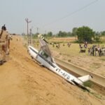Kasganj, India: A trainee pilot survived after a Cessna 152 trainer aircraft operated by Chetak Aviation made an emergency landing and crash-landed in a field near an expressway in Uttar Pradesh's Kasganj district on June 29, prompting an investigation by the Directorate General of Civil Aviation (DGCA). The aircraft, registered as VT-AFB, had departed from Aligarh Airport on a solo training sortie with only the trainee pilot on board. According to the DGCA, the flight was part of a routine solo training exercise when the aircraft encountered an emergency, forcing the pilot to carry out a precautionary landing in an open field near an under-construction expressway in Kasganj. The trainee pilot has been identified by multiple local media reports as aged 28 years. Chetak Aviation confirmed that she had accumulated the required flying hours to undertake solo flights and had been training with the flying training organisation for over a year. According to the flying school, the aircraft took off from Aligarh at approximately 1:05 p.m., while the emergency occurred at around 3:00–4:00 p.m. near Kasganj. Soon after exiting the aircraft, the trainee pilot contacted the academy to report the occurrence, following which local police and emergency responders were alerted. The DGCA, in its official statement, said, "Chetak Aviation Cessna 152 aircraft VT-AFB engaged in solo flying at Aligarh has crash landed in a field in Kasganj. She (trainee pilot) is reported to be safe. DGCA is investigating the occurrence." Chetak Aviation stated that the aircraft came down beside the expressway and that the pilot remained safe. Kasganj Police said she was taken to a local hospital for medical examination and her condition was stable. The exact cause of the emergency landing has not yet been established. Initial reports indicate that the aircraft experienced a technical snag while airborne, compelling the pilot to attempt a forced landing. The flying training organisation said it would determine the cause only after examining the aircraft and speaking with the trainee pilot. Eyewitnesses reported seeing the aircraft descend rapidly before coming to rest in a field adjacent to the roadway. Some local reports claimed the aircraft may have struck overhead power lines before landing, although this has not been confirmed by the DGCA. The crash site drew large crowds of local residents, while police officials quickly secured the area and facilitated the pilot's evacuation. Photographs and videos circulating online showed the aircraft lying on its side with visible damage to one wing and the rear fuselage after skidding off the landing area. Following the occurrence, the DGCA initiated a formal investigation to determine the circumstances that led to the emergency landing. According to subsequent reports, all training flights operated by Chetak Aviation have been suspended until the investigation is completed. The incident marks the second trainer aircraft occurrence in Uttar Pradesh within four days. On June 26, a trainee pilot sustained serious injuries at Kanpur's Chakeri Airport after disembarking from a Tecnam P2006T trainer aircraft operated by Garg Aviation while its engine was still running and was struck by the rotating propeller. That incident is also under investigation by the DGCA.