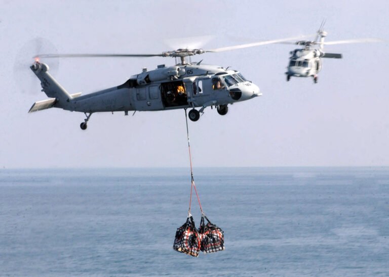 US Navy Helicopter Makes Emergency Landing In Arabian Sea; One Crew Member Missing SEO DES: Four crew were aboard the US Navy MH-60S Sea Hawk when it made an emergency water landing during routine operations; three were rescued & one remains missing SOCIAL: A US Navy MH-60S Sea Hawk helicopter assigned to USS George H.W. Bush made an emergency water landing in the Arabian Sea during routine operations on July 1, leaving one crew member missing while three others were rescued and are in stable condition. The incident occurred at approximately 3:30 a.m. ET, prompting an extensive search-and-rescue operation involving US Navy ships and aircraft deployed in the region. Officials said there is no indication the emergency was caused by hostile action, and the cause of the water landing remains under investigation. The helicopter was operating from the USS George H.W. Bush Carrier Strike Group, which is deployed to the Middle East in support of maritime security and regional operations under US Central Command (CENTCOM). Search efforts for the missing crew member are ongoing. Image: Marvin Harris (Wikimedia) Video: US Navy United States: A United States Navy MH-60S Sea Hawk helicopter assigned to the aircraft carrier USS George H.W. Bush (CVN-77) made an emergency water landing in the Arabian Sea early on July 1, leaving one crew member missing while three others were rescued safely, according to the US Naval Forces Central Command (NAVCENT) and US 5th Fleet. The Navy said the helicopter conducted the emergency water landing at approximately 3:30 a.m. Eastern Time (ET) during routine operations in the Arabian Sea. Authorities have not disclosed the exact location of the incident or what prompted the crew to ditch the aircraft into the water, stating only that the cause remains under investigation. The aircraft was carrying four crew members at the time of the incident. Three were recovered shortly after the emergency landing and were reported to be in stable condition aboard USS George H.W. Bush, while an extensive search-and-rescue operation remains underway to locate the fourth crew member. US Navy ships and aircraft deployed in the region continue to support the ongoing search. In its official statement, NAVCENT emphasized that there is no indication the emergency was caused by hostile action, effectively ruling out any immediate evidence of enemy fire or an attack. Investigators have not identified mechanical failure, weather or any other contributing factor, and officials have yet to release the identities of the crew members pending family notification. The helicopter involved was an MH-60S Sea Hawk, a multi-mission naval helicopter used primarily for combat support, logistics, search and rescue, medical evacuation, maritime security, humanitarian assistance and disaster relief missions. The variant typically operates with a crew of three to four personnel and is equipped with large sliding cabin doors to facilitate rescue and transport operations. The MH-60S was operating from USS George H.W. Bush, a Nimitz-class nuclear-powered aircraft carrier deployed to the U.S. Central Command (CENTCOM) area of responsibility. The carrier departed Naval Station Norfolk, Virginia, on March 31, 2026, transited around the Cape of Good Hope, and has been operating in the Arabian Sea since April 23 as part of the U.S. military's expanded presence in the Middle East. USS George H.W. Bush is embarked with Carrier Air Wing 7, which includes Helicopter Sea Combat Squadron (HSC) 5 "Nightdippers", the squadron that operates the MH-60S Sea Hawk. While the Navy has not officially identified the helicopter's unit, HSC-5 is the squadron assigned to fly the MH-60S from the carrier. The incident occurred amid heightened U.S. military activity across the Middle East. George H.W. Bush Carrier Strike Group is one of the principal naval forces operating under U.S. Central Command, supporting maritime security operations and safeguarding key shipping lanes across the Arabian Sea, Gulf of Oman, Red Sea and Arabian Gulf. According to military reports, approximately 50,000 U.S. service members are currently deployed across the CENTCOM area, with a significant proportion of the Navy's deployed battle force ships operating in the region. Officials have not confirmed whether the helicopter has been recovered or remains in the sea. Likewise, they have not indicated whether the aircraft was conducting a training mission, operational sortie or logistics flight when the emergency occurred. The Navy said search efforts for the missing crew member will continue while investigators work to determine what caused the helicopter to ditch.