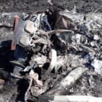 SACAA Preliminary Report Details Cessna 172 Cockpit Fire And Student Pilot's Escape SEO DES: An Aviation Junction Flying School student pilot was seriously injured after a Cessna 172M caught fire during a go-around near Secunda on May 27, 2026 SOCIAL: The South African Civil Aviation Authority (SACAA) has released its preliminary report into the 27 May 2026 crash of a Cessna 172M (ZS-JBO) near Secunda, Mpumalanga, involving a solo student pilot of Aviation Junction Flying School. During a go-around after encountering windshear, the aircraft's flaps failed to retract, the airspeed decayed, the stall warning activated, and a cockpit fire broke out. The pilot conducted a forced landing, burned through a jammed seatbelt using the cockpit fire, and jumped from the aircraft moments before impact, surviving with serious burn and facial injuries. The aircraft was destroyed by fire. Investigators found the aircraft was airworthy before the flight, but the fire severely damaged the wreckage, preventing determination of the exact impact sequence. The AIID said the investigation remains ongoing, and no safety recommendations have been issued at this stage. Secunda, South Africa: The South African Civil Aviation Authority (SACAA) has released its preliminary accident report into the crash of a Cessna 172M (registration ZS-JBO) that occurred on 27 May 2026 near Graceland Golf Course, Secunda, Mpumalanga Province, South Africa. The accident involved one person on board, a 20-year-old Saudi Arabian student pilot conducting a solo training flight. The student survived with serious injuries, while the aircraft was destroyed by an in-flight fire following an attempted go-around. The aircraft, operated by Aviation Junction Flying School under Part 141 training operations, departed Secunda Aerodrome (FASC) at approximately 0930 UTC for a solo training sortie in the general flying area. The flight was conducted during daylight under visual meteorological conditions (VMC). Before departure, the student pilot completed the required pre-flight inspections and refuelled the aircraft with 60 litres of Avgas. No defects had been recorded in the aircraft's flight folio before the flight. According to the preliminary investigation, the accident sequence began when the student returned to Runway 29 at Secunda. During the final approach, with the wing flaps selected to 30 degrees, the aircraft encountered windshear, prompting the pilot to initiate a go-around. During the manoeuvre, the pilot attempted to retract the flaps, but they failed to retract. The aircraft's indicated airspeed then decreased, activating the stall warning. Although the student managed to recover from the developing stall, he soon noticed smoke inside the cockpit, followed almost immediately by fire. Realising the aircraft could no longer continue safely, the student pilot selected a field near Graceland Golf Course for a forced landing. While flying over the golf course perimeter fence, he attempted to unbuckle his seatbelt but found it jammed. In the report investigators state that the pilot used the cockpit fire to burn through the seatbelt material, allowing him to free himself. He then opened the aircraft's left-side door and jumped from the aircraft approximately six to eight feet above the ground, moments before it crashed. The pilot sustained serious facial injuries from the jump and burn injuries to both arms and his right leg. Golf course workers who witnessed the accident reported hearing the aircraft approach followed seconds later by a loud bang. They observed grey-to-black smoke rising from the wreckage and found the aircraft engulfed in flames upon reaching the site. The workers rescued the injured pilot by moving him away from the advancing grass fire before emergency services arrived. He was initially treated at a hospital in Secunda before being transferred to a specialist hospital in Gauteng for facial surgery. The accident occurred at approximately 1030 UTC, around 2.33 kilometres from Secunda Aerodrome, at an elevation of 5,195 feet. There were no fatalities, no passengers, and no injuries to people on the ground. The aircraft was destroyed by the post-impact fire. Investigators noted that the aircraft's nose landing gear and left main landing gear had separated from the fuselage, while both propeller blades were found bent backwards. However, because the fire destroyed much of the aircraft, investigators stated it is not yet possible to determine precisely how the aircraft impacted the ground. The cockpit and cabin were almost completely consumed by fire, making identification of several components difficult. The pilot held a valid Student Pilot Licence (SPL) and had accumulated 74.2 total flying hours, including only 4.1 hours on the Cessna 172M, having transitioned from a Tecnam Echo earlier in 2026. His Class 2 aviation medical certificate was valid until November 2028 with no restrictions. The aircraft, a 1975-built Cessna 172M, had accumulated 22,791.5 airframe hours. It held a valid Certificate of Airworthiness and Certificate of Release to Service, with its latest maintenance inspection completed only weeks before the accident. The report also notes the aircraft had previously been involved in four earlier occurrences between 2003 and 2022, including a forced landing following engine power loss, a wind-related ground damage event, a hard landing, and a nose-wheel collapse after a bounced landing. Weather conditions recorded at nearby Ermelo Aerodrome around the time of the accident indicated 210-degree winds at 5 knots, 10 kilometres visibility, 20°C temperature, no cloud, and a QNH of 1028 hPa. The report stresses that these findings do not assign blame or liability, and that the investigation remains ongoing. At this stage, no safety recommendations have been issued.