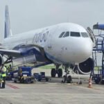 Gujarat, India: An IndiGo flight operating from Dubai to Mumbai made a precautionary emergency landing at Rajkot International Airport in Gujarat on Monday, July 27, after the crew reportedly detected a smoke alert from the aircraft's cargo hold area. All 194 people onboard, comprising 187 passengers and seven crew members, safely disembarked after the Airbus A321 landed at Rajkot. The flight, IndiGo 6E 1452, was operating from Dubai International Airport to Chhatrapati Shivaji Maharaj International Airport in Mumbai. The aircraft departed Dubai at around 11:30 a.m. IST before being diverted to Rajkot as a precaution following the reported smoke indication from the cargo hold. An airport official said, "Flight IGO1452, aircraft type A321, operating from Dubai to Mumbai, was diverted to Rajkot due to smoke detected in the cargo hold area." Airport authorities were alerted to the situation at around 2:45 p.m., following which a full emergency was declared at Rajkot International Airport. Emergency response teams, including fire tenders, ambulances, rescue vehicles and medical personnel, were deployed as part of the airport's emergency procedures. Local hospitals and police authorities were also alerted and kept on standby. The flight crew initially detected smoke indicators in the cargo hold during the mid-air journey, prompting the diversion to Rajkot as a precaution. IndiGo, however, said in a statement: “IndiGo flight 6E 1452, operating from Dubai to Mumbai, was diverted to Rajkot International Airport today as a precautionary measure due to a technical issue. The aircraft landed safely at Rajkot, and all passengers have deboarded securely. An inspection of the aircraft is currently underway before it is cleared to resume operations,” the spokesperson said. The Airbus A321 landed safely at Hirasar International Airport, also known as Rajkot International Airport, at approximately 3:27 p.m. Police, security personnel and firefighters were present at the airport as the aircraft arrived. No injuries were reported among the passengers or crew. Sources at the airport said IndiGo was arranging another aircraft to carry the affected passengers onward to Mumbai. The exact cause was not immediately established, and reports did not confirm whether an actual fire occurred in the cargo compartment. Authorities were expected to examine the aircraft to determine the cause. The incident triggered the airport's full emergency response protocol, but the aircraft completed the landing without any reported damage or injuries.
